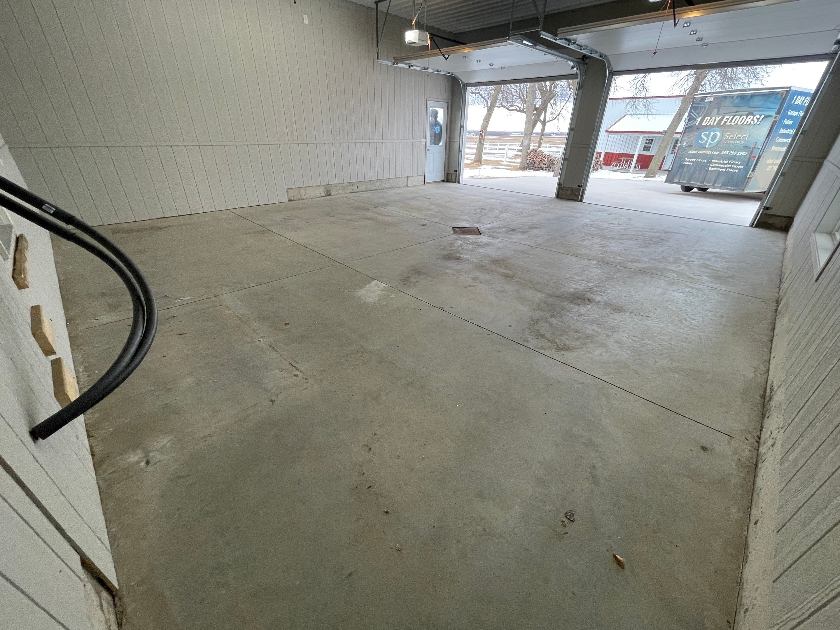 Garage using Slate Stone by Select Painting, Coatings & Garage Cabinets