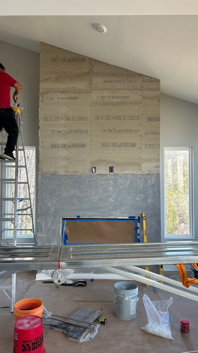 Floor to Ceiling Fireplace Surround by Footprints Floors of Nashville