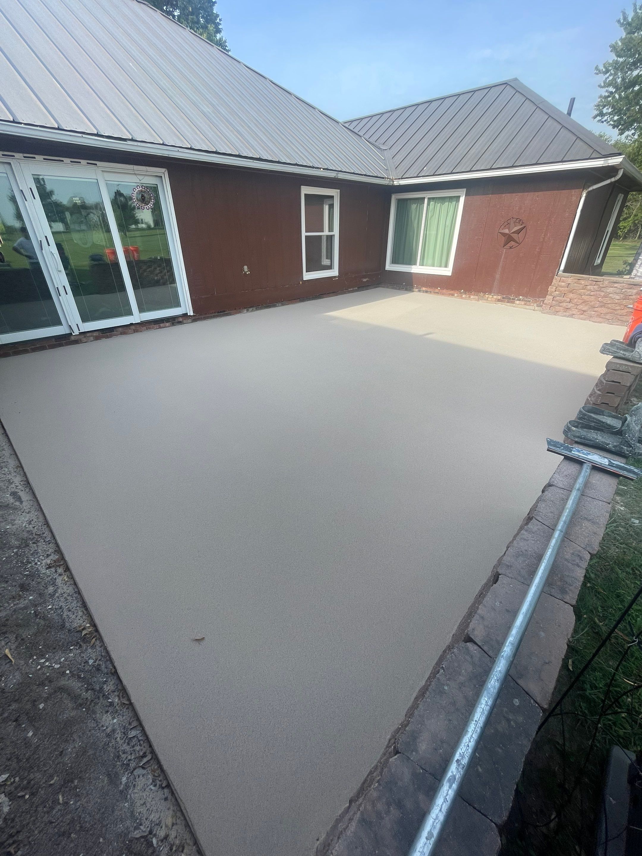 Concrete Patio Resurfacing and Protective Coating in Winfred, South Dakota by Select Painting, Coatings & Garage Cabinets