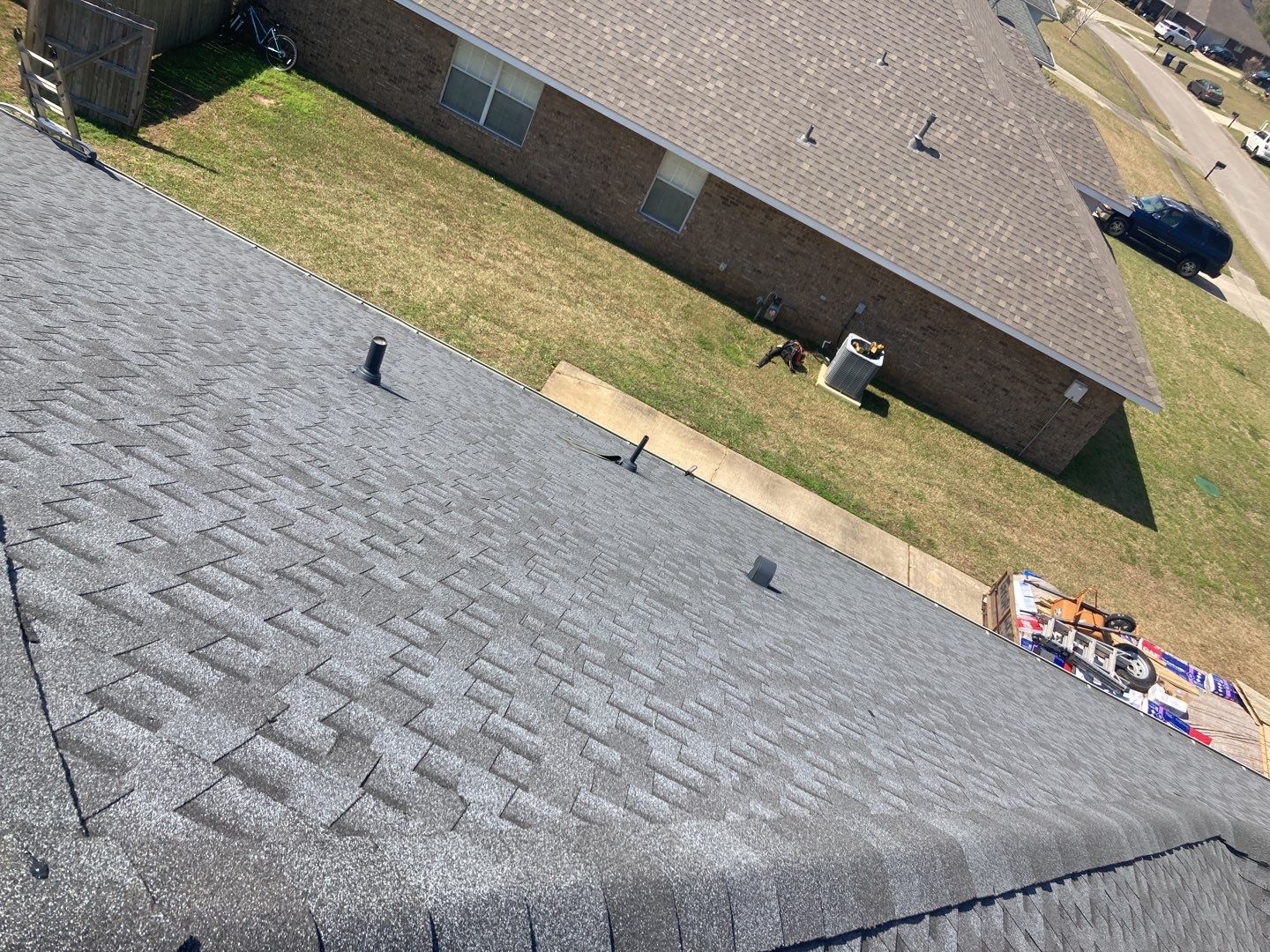 Residential Roofing Installation using Roof Replacement by American Roofing & Construction LLC