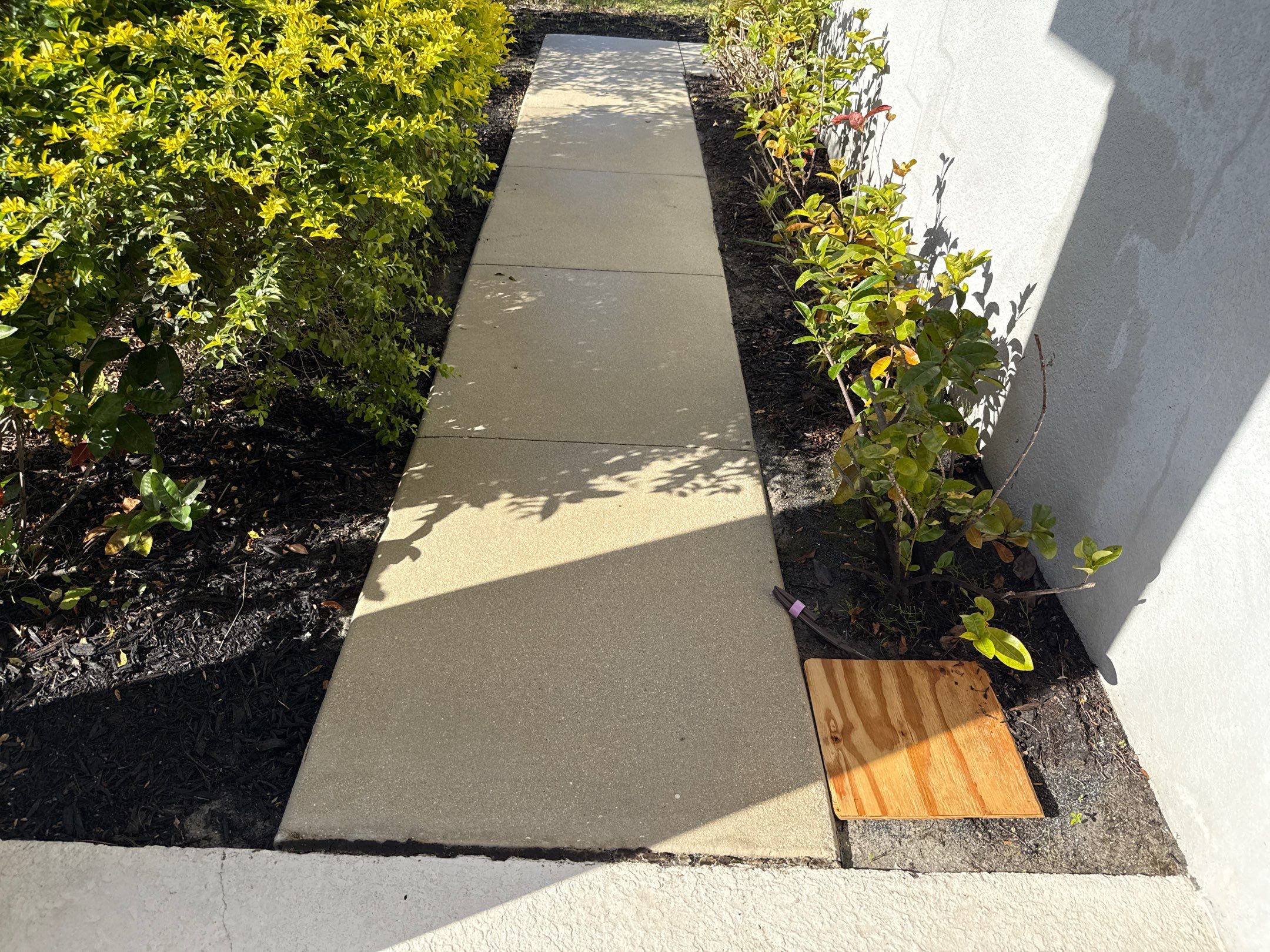 Oil Stain Removal & Concrete Cleaning – The Heights Community, Bradenton, FL by Sunshine AquaWash