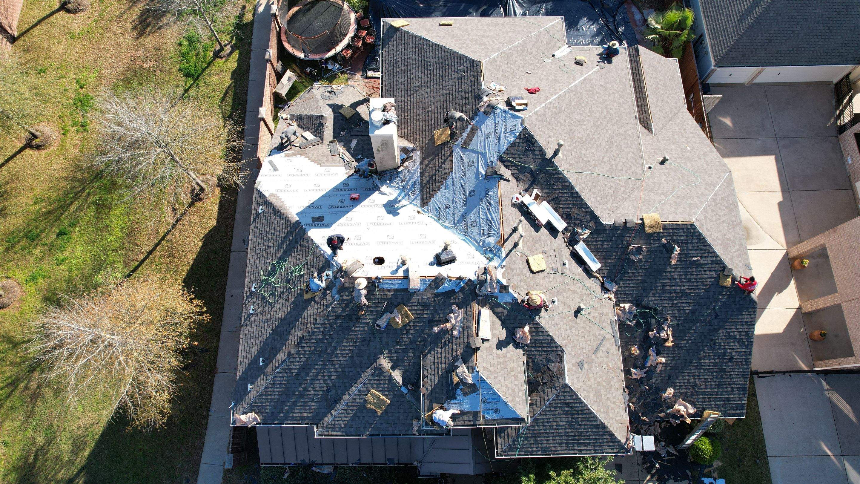 Two-Story Roof Replacement & Chimney Stucco Repair — Houston, TX by PL Roofing & SB Roofing, LLC.