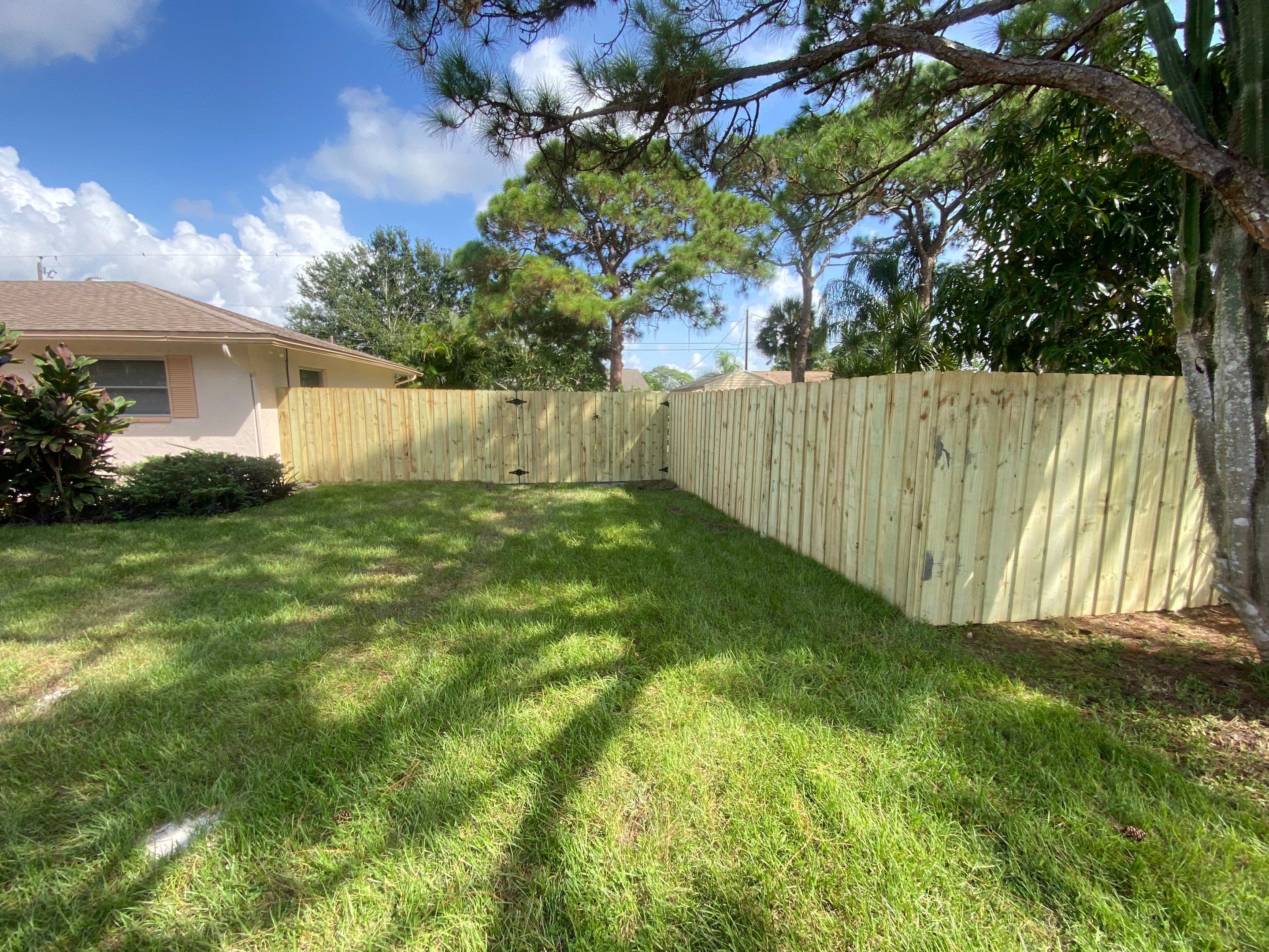 Wood Fence Installation using Board on Board Wood Fence by Asap fence and gates, LLC
