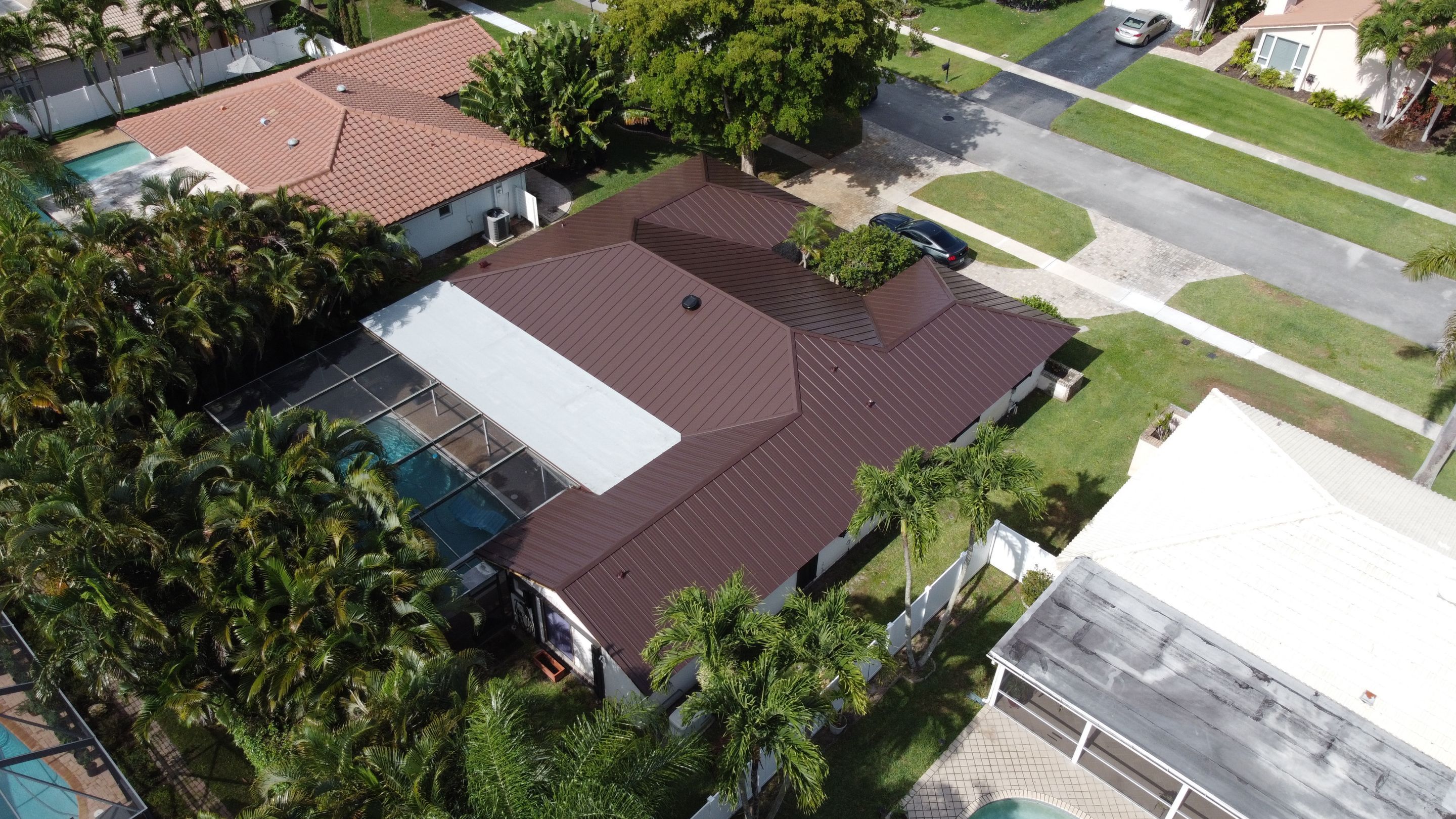 Residential Roofing Installation using 1" Nail strip metal roof by BLUES BROTHERS CONSTRUCTION CORP