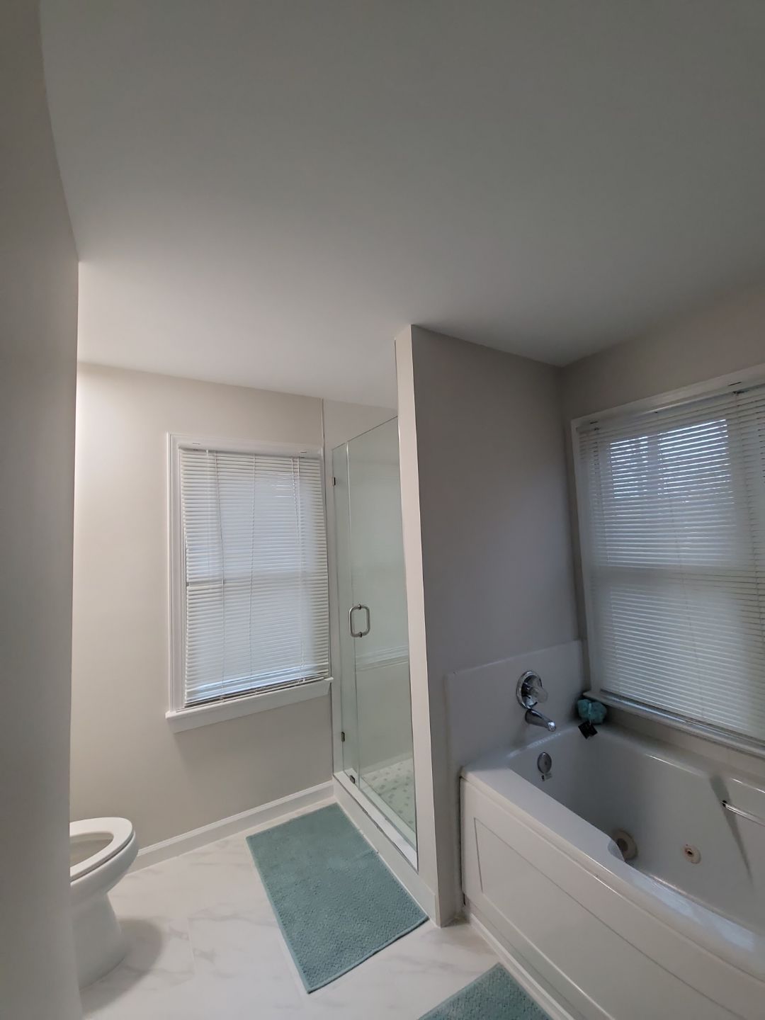 From Cramped & Carpeted to Bright & Modern: A Cary Bathroom Transformation by Elite Remodeling and Design LLC