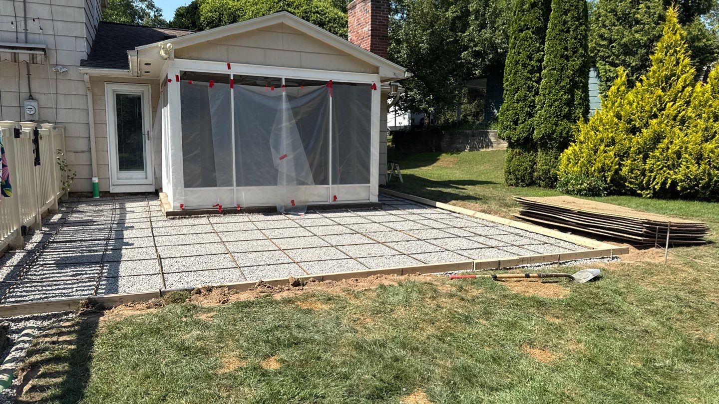 Broom finished concrete patio and sidewalk  by NG Masonry & Construction LLC