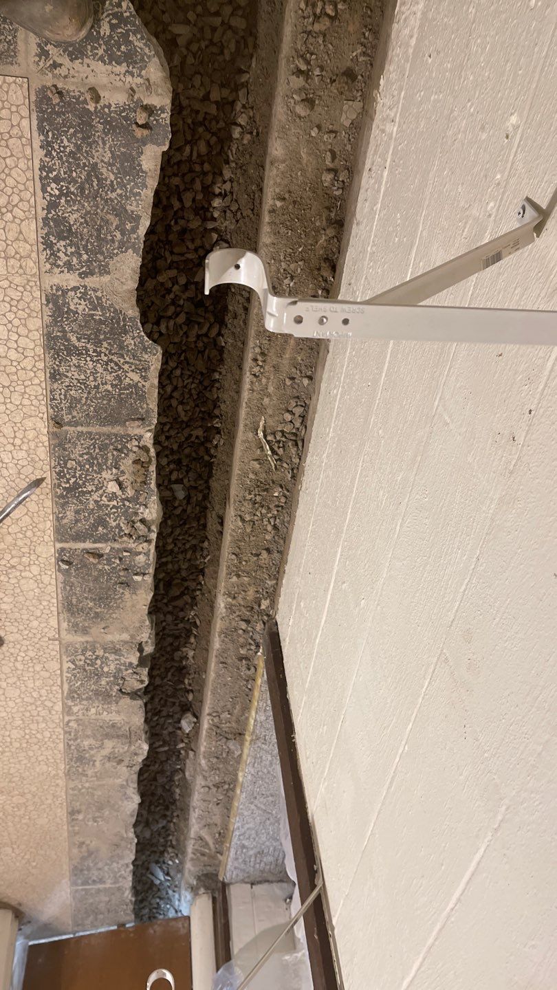 Interior Waterproofing Using GrateDrain™ Products by Toledo Basement Repair 