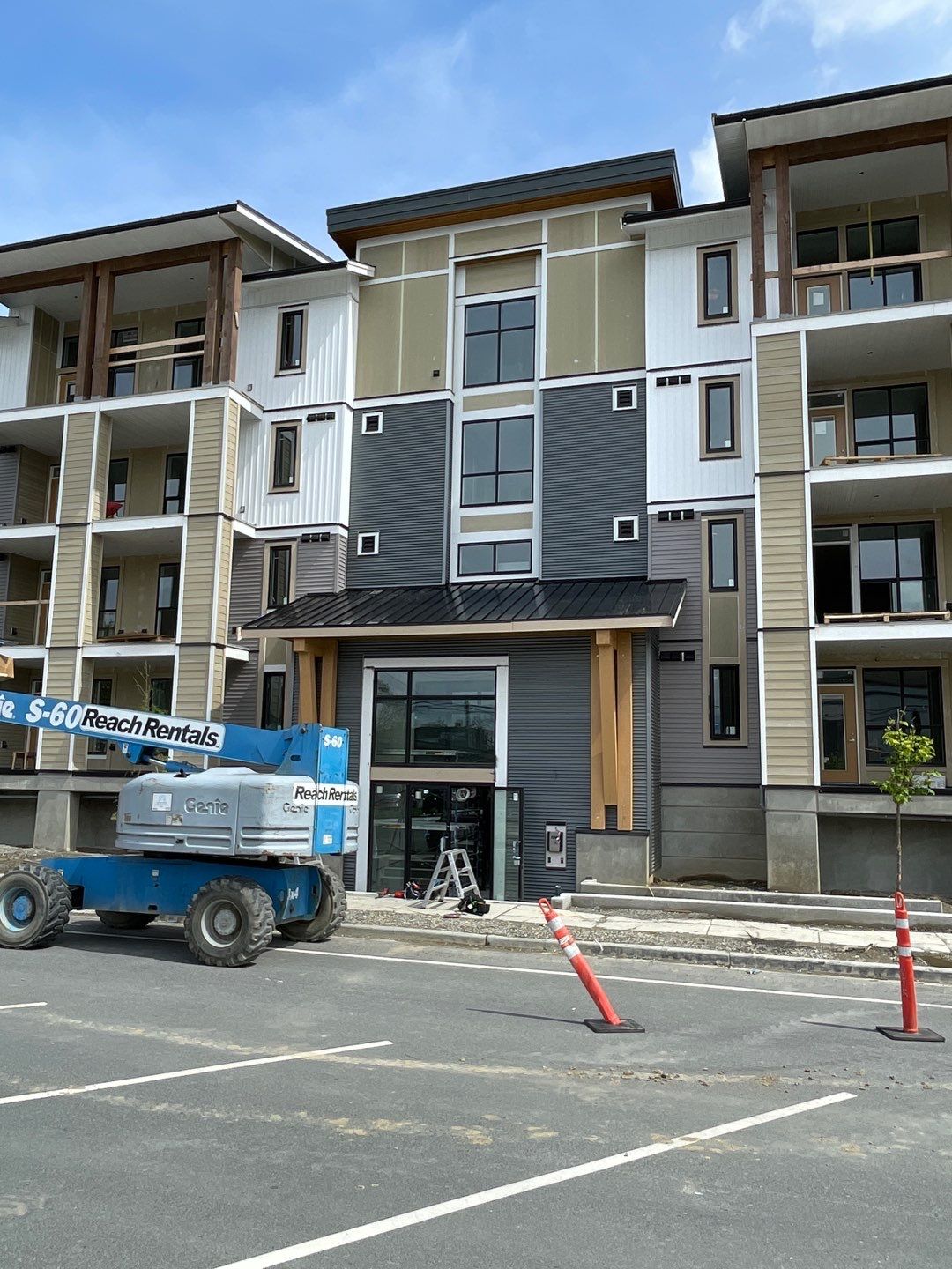 Large apartment with sbs, shingles and prolok metal  by Top Notch Roofing Inc