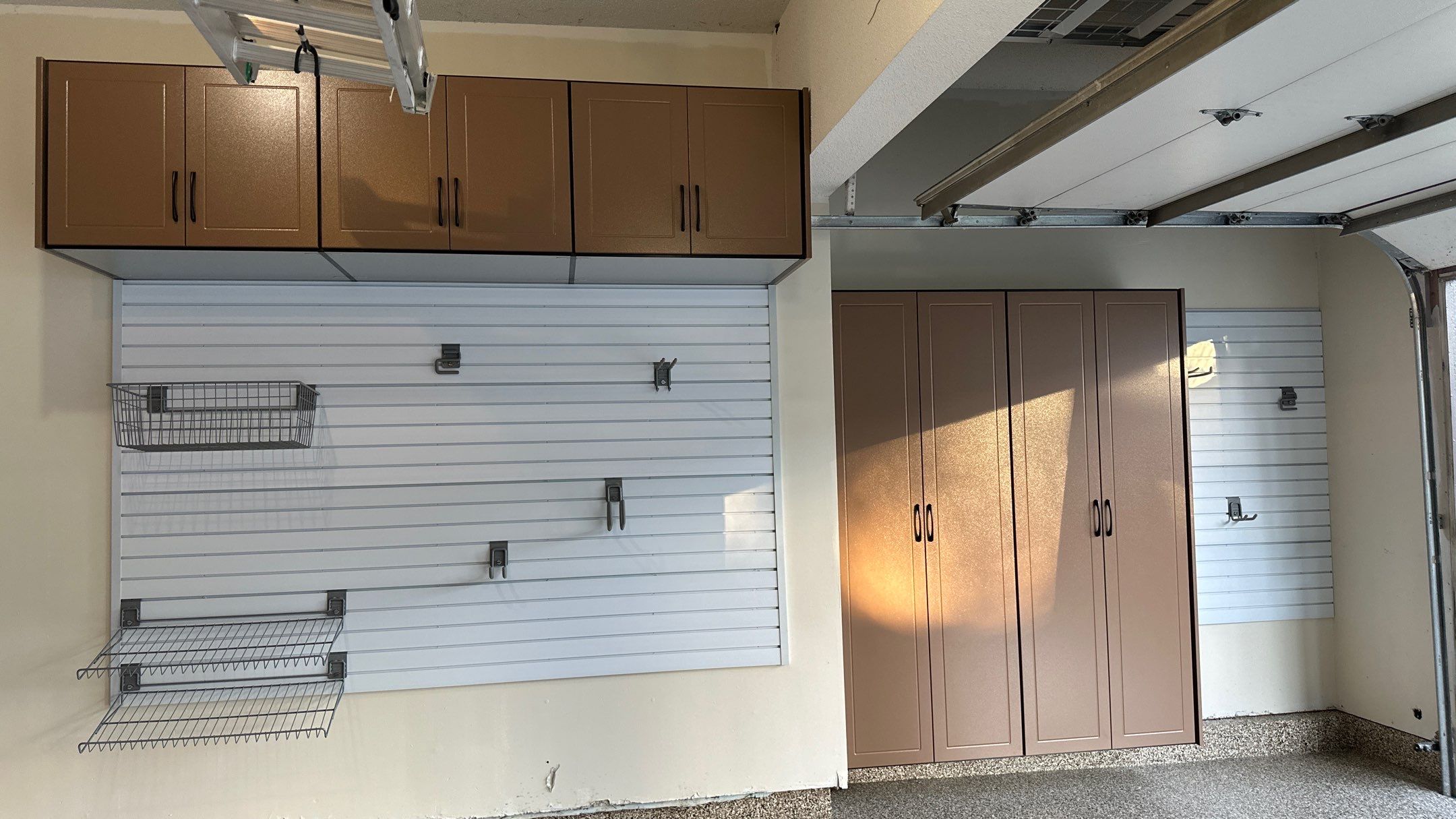 Jake P upgraded his garage with brand new cabinets and a new floor  by Banner Garage