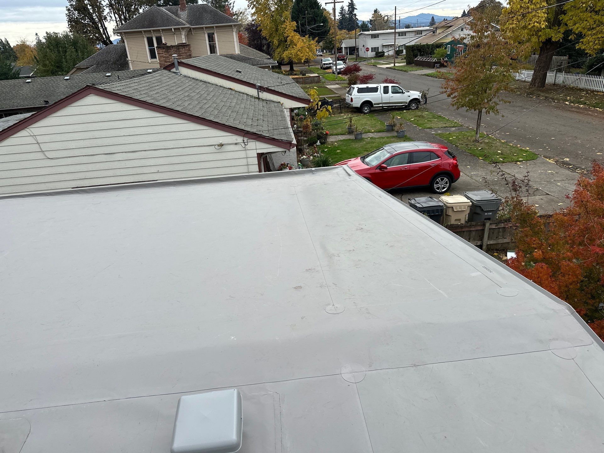 Residential Membrane Roof Replacement by Orezona Building & Roofing Company, Inc.