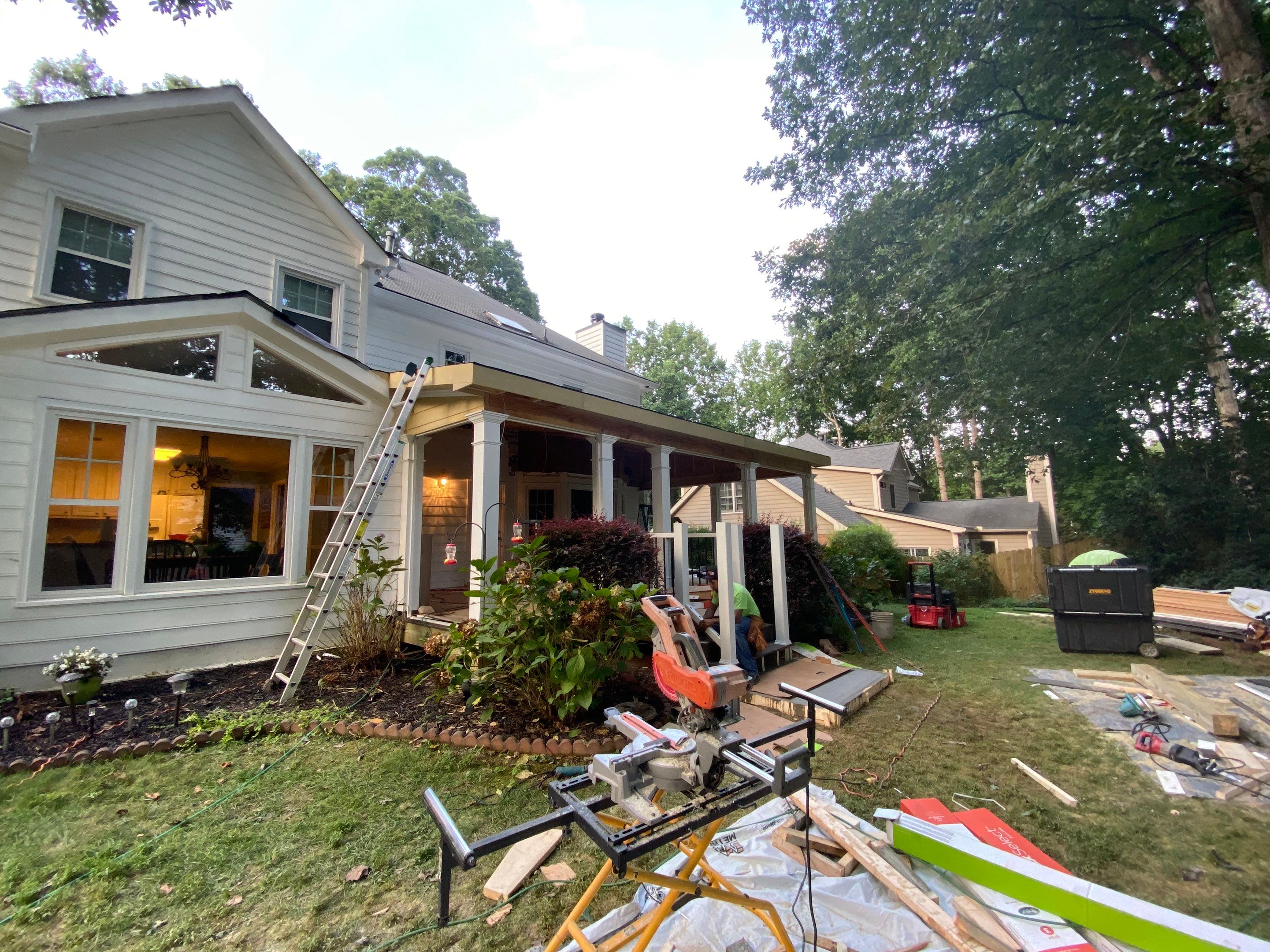 Custom Screened Porch with Beadboard Ceiling and Composite Decking by Swift Home Renovations