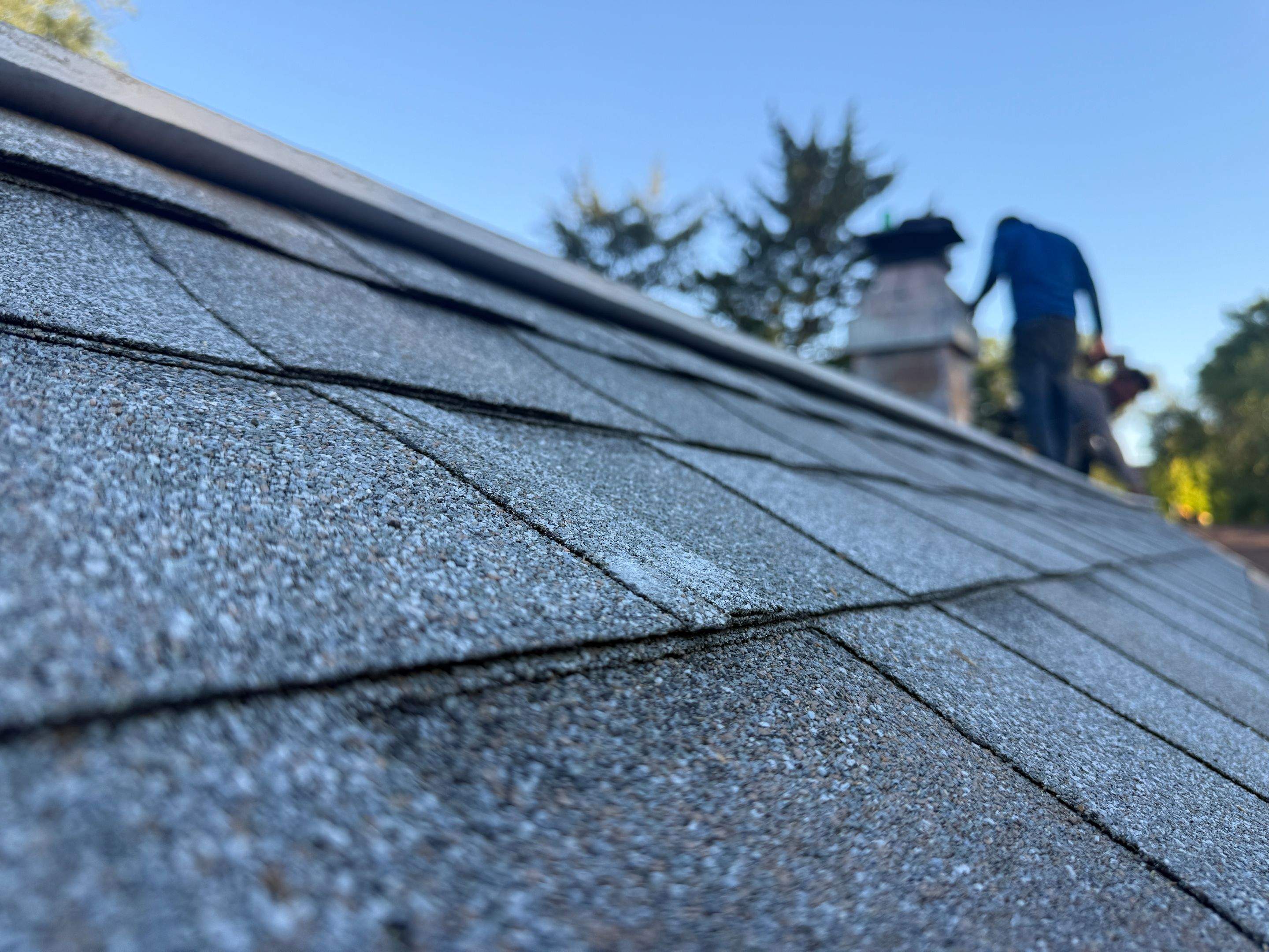 Asphalt Shingle and EPDM Membrane Roof Installation in Mineola by Star Home