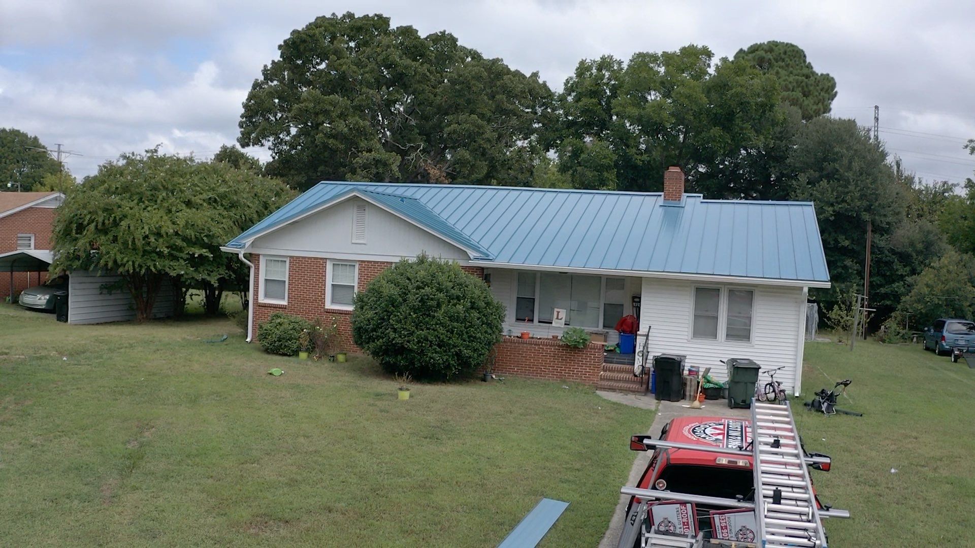 Carolina Blue Standing Seam Roof by Just In Time Roofing and Restoration