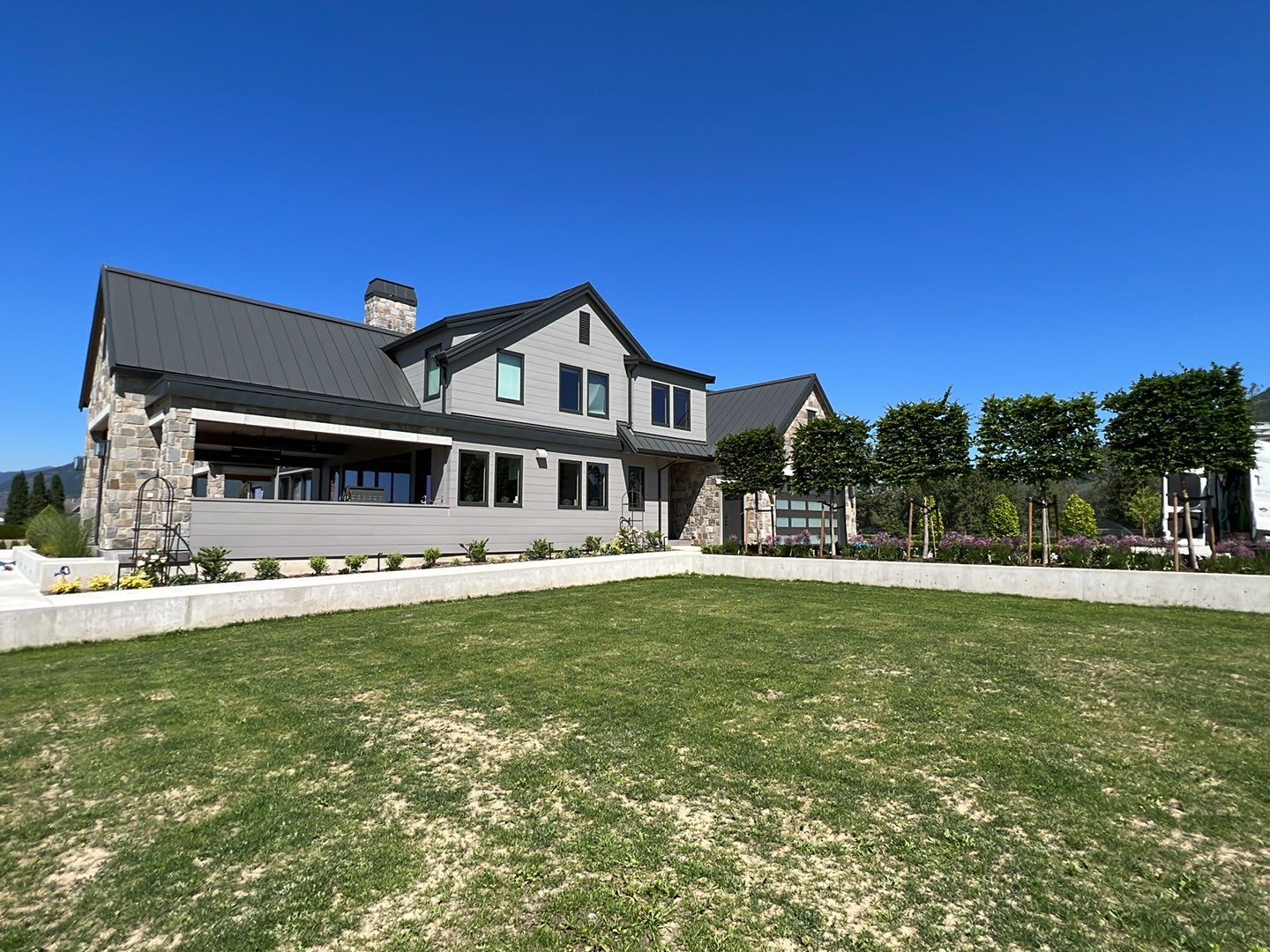 Residential Roofing Installation using 12" Prolok metal  by Top Notch Roofing Inc