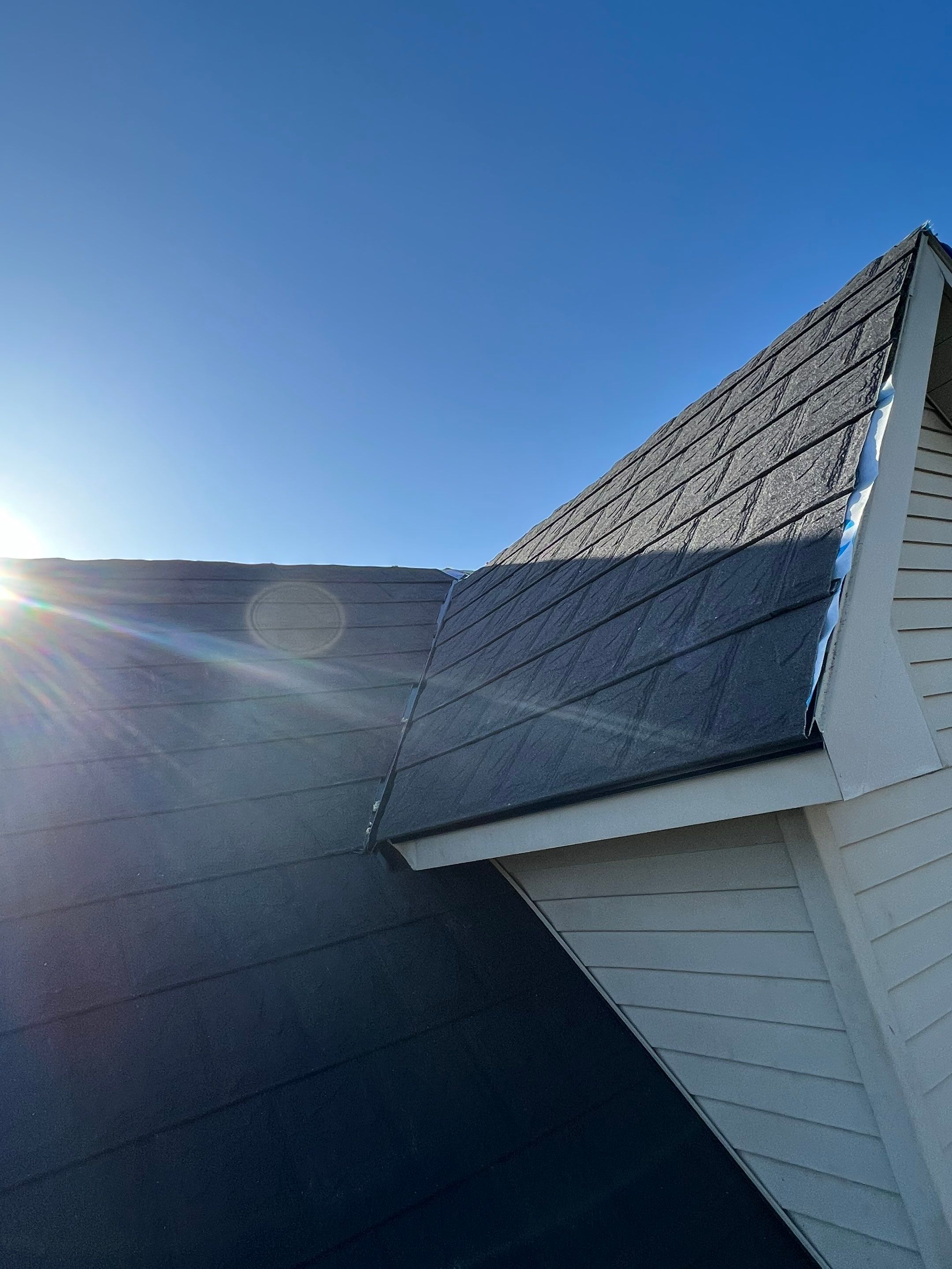 Residential Roofing Repair using Metstar Stone Coated Charcoal by Nitro Roofing and Construction
