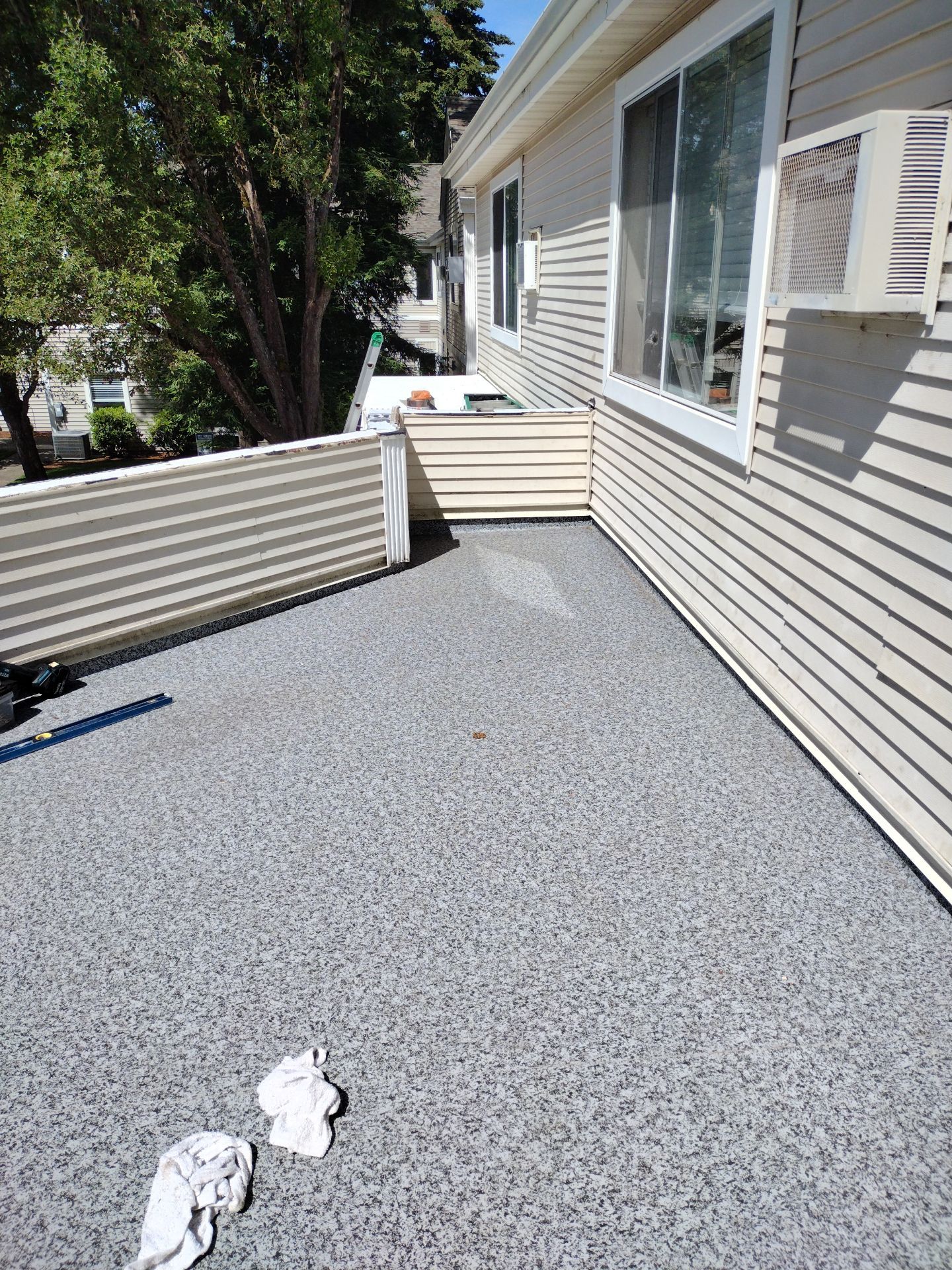 Dec-Tec Walkable Membrane using Dec-Tec (Color: Granite) by Orezona Building & Roofing Company, Inc.