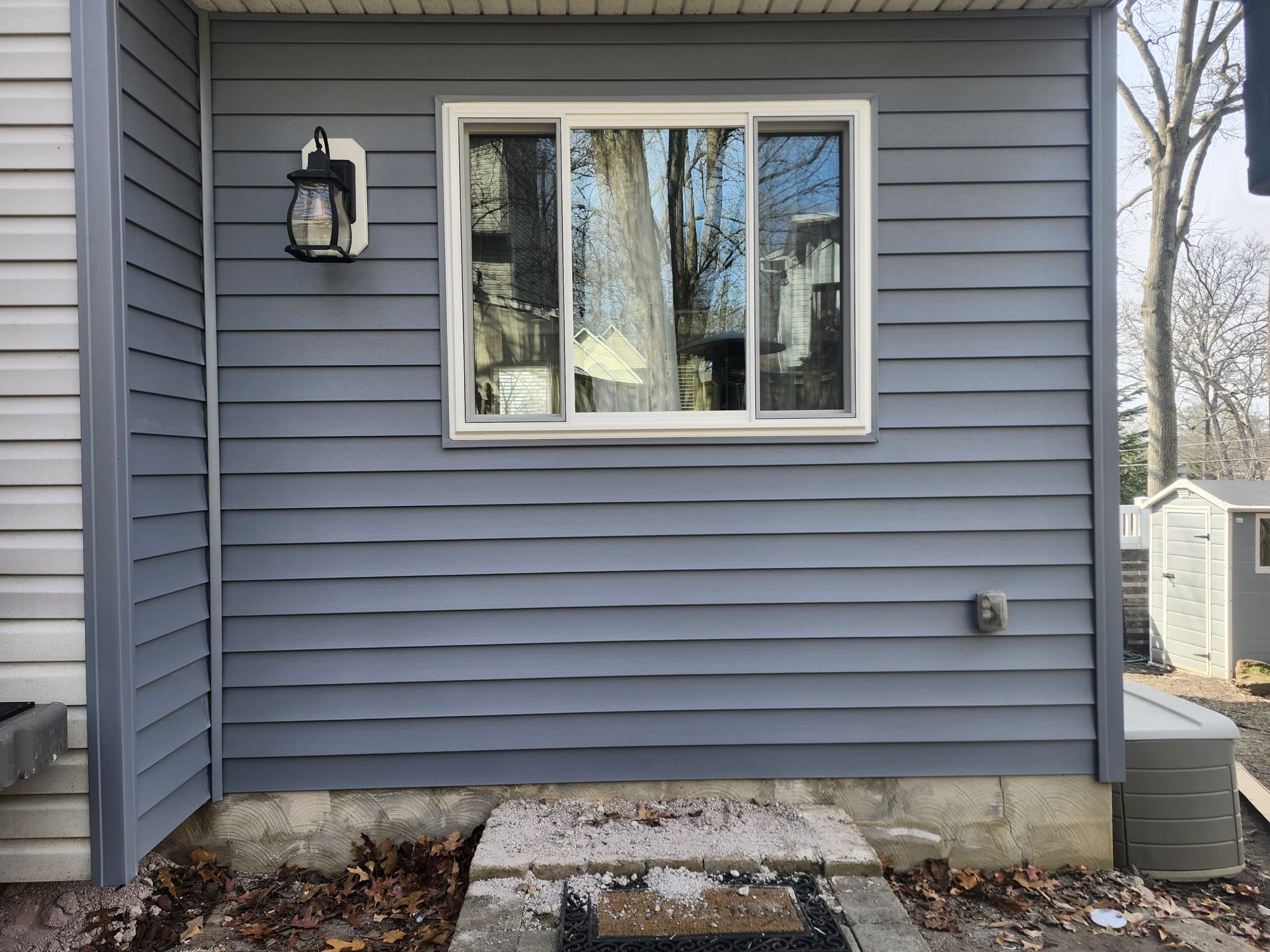 Provia 3 part slider in place of an entry door by Window Depot of Annapolis