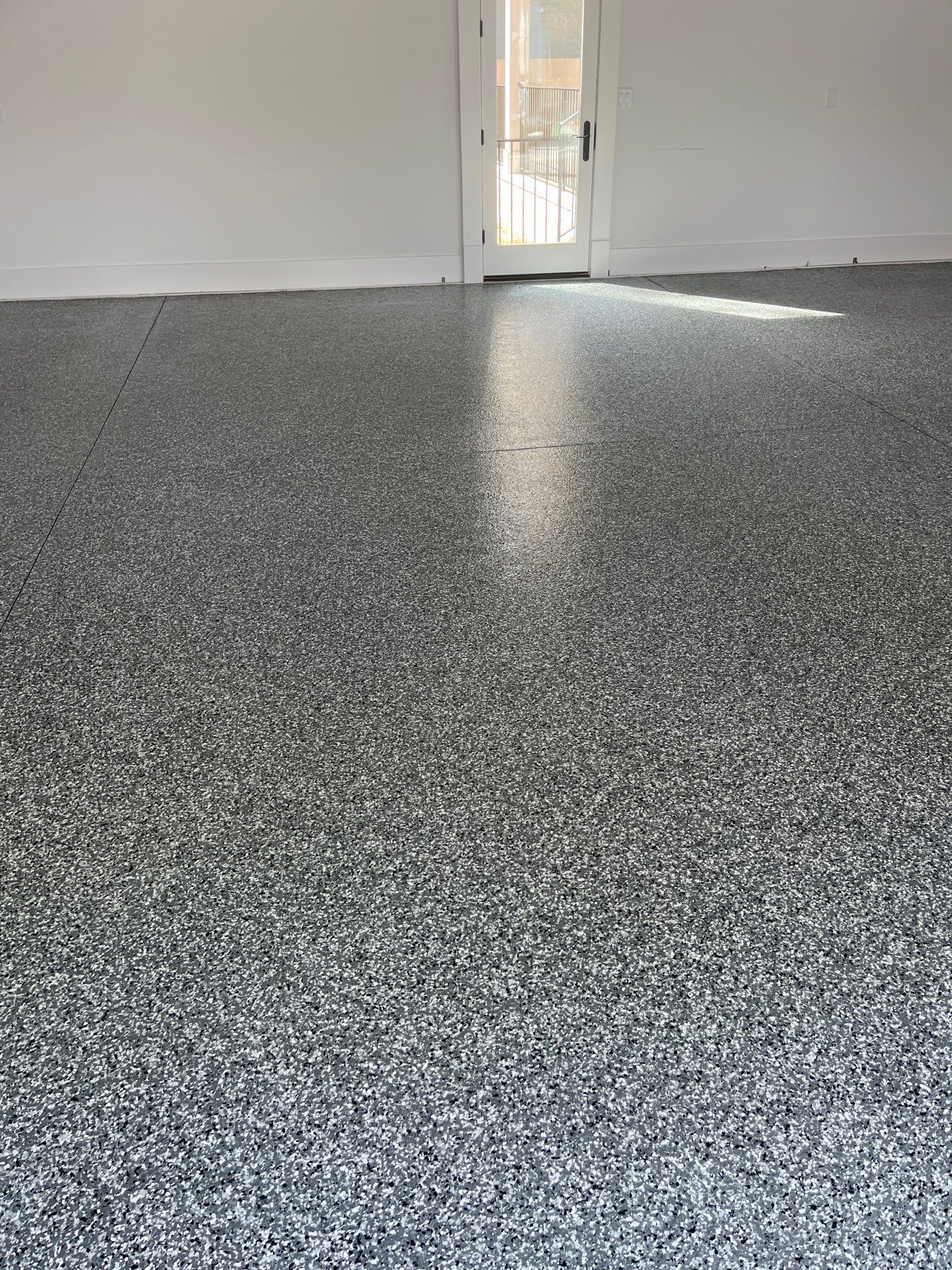 Garage Floor Coating using Wombat by My Garage Floor Guys