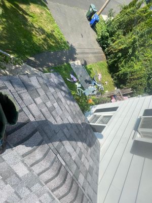 Commercial Roofing Installation using Owens Corning TruDefinition Midnight Plum