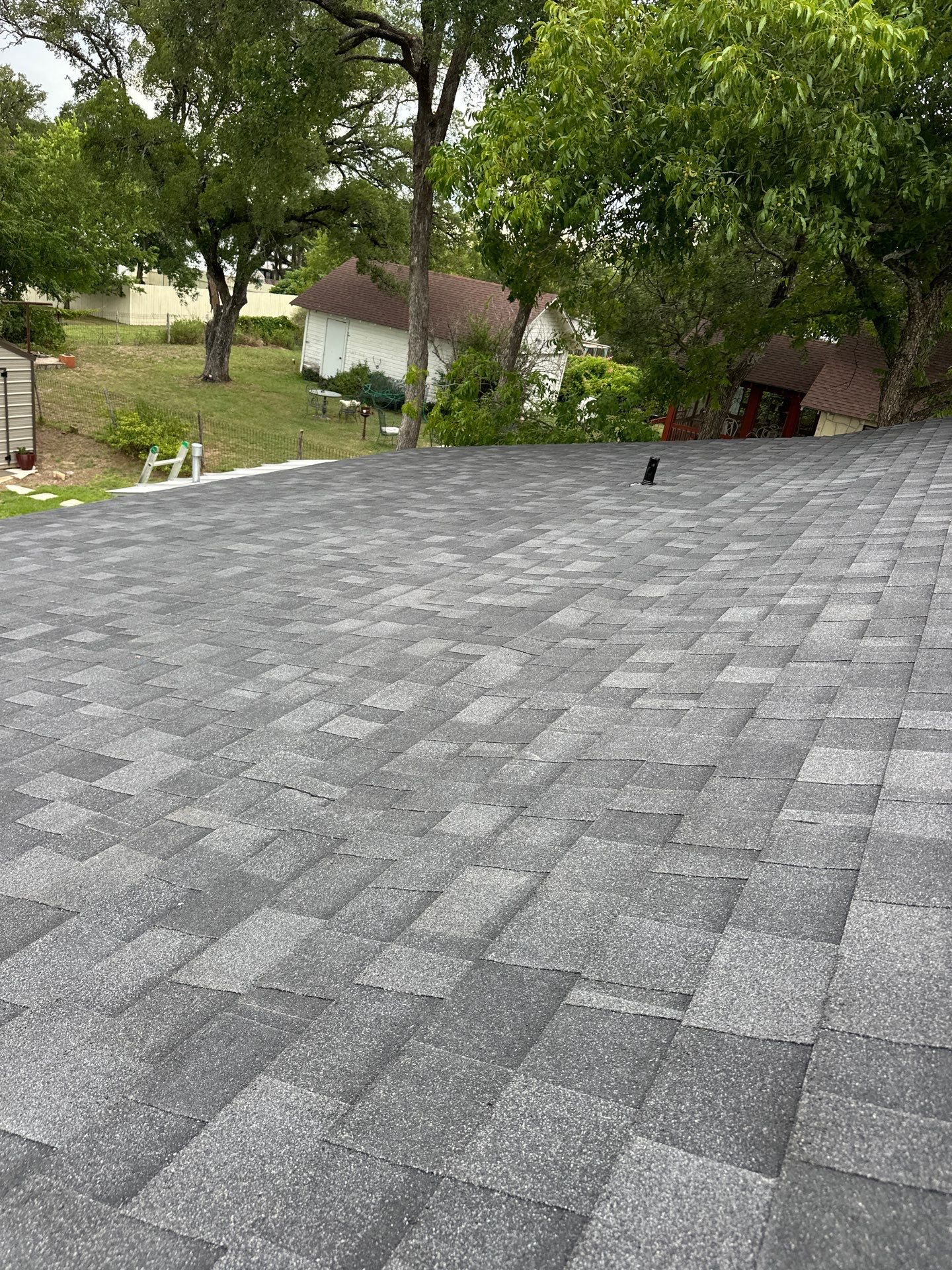 Residential Roofing Installation using Owens Corning Oakridge Onyx Black by DeZign Roofing & Exteriors