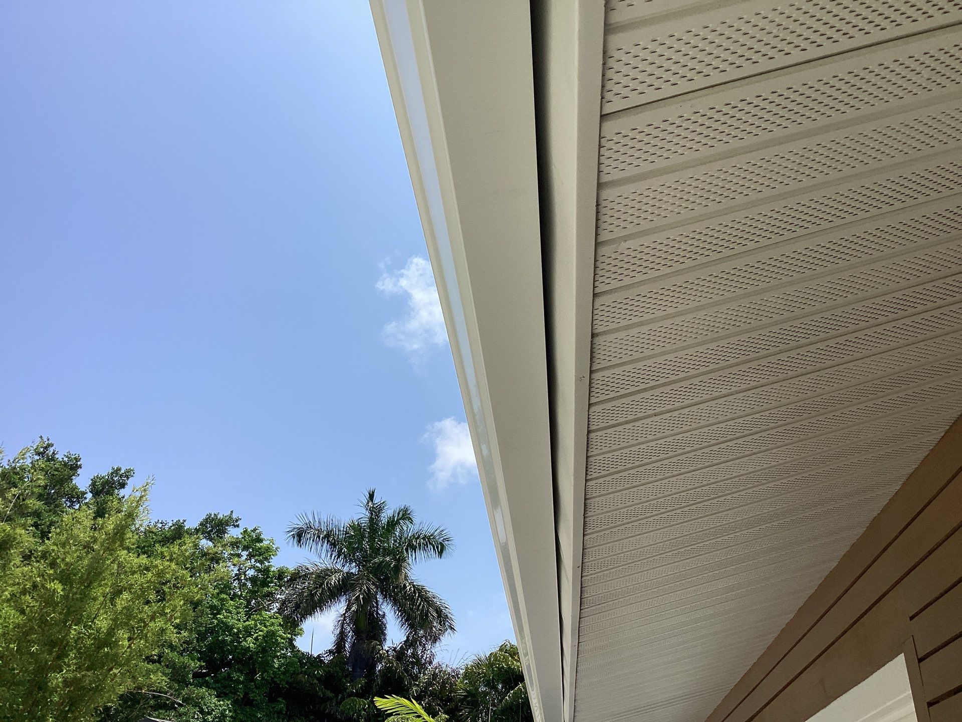 White Seamless Gutters and Downspouts in Sarasota FL by Gutter Professors