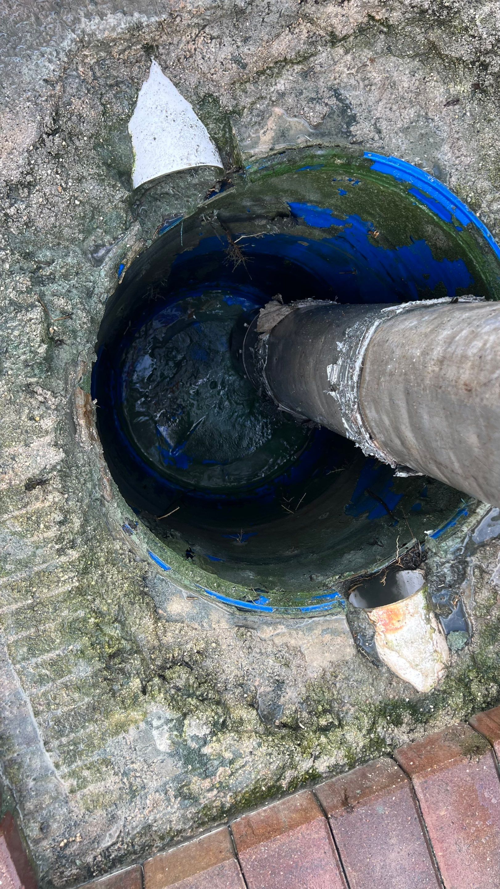 Pelican Landing Tennis Court Catch Basin Cleaning by APS Power & Water