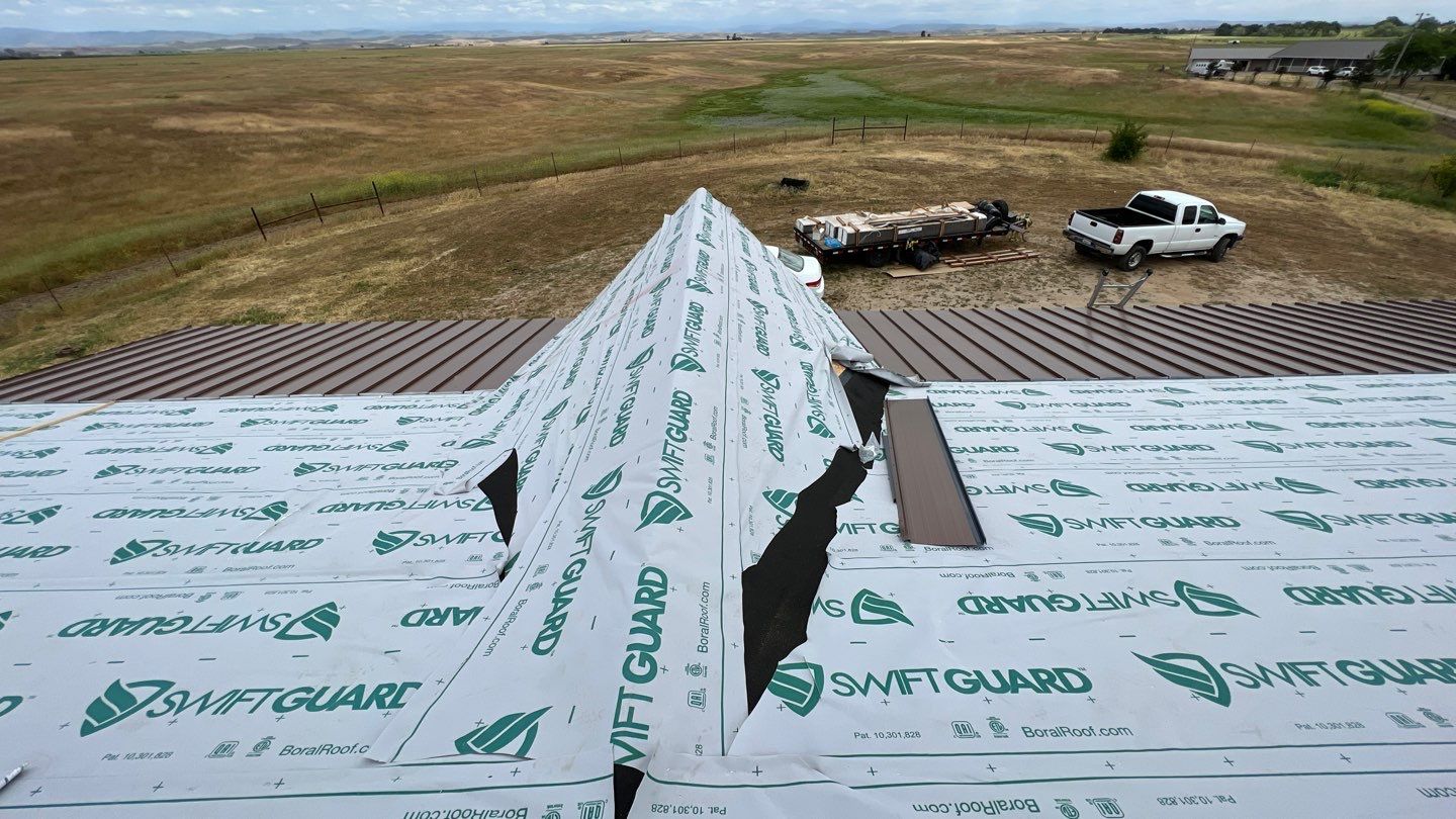 Metal roofing installation using Standing seam metal roofing system by Straight Edge Roofing Inc