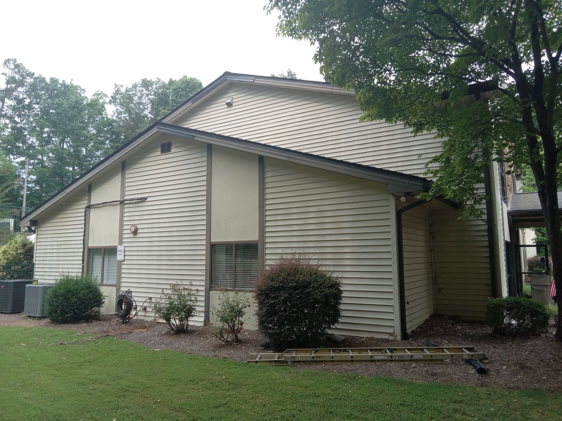 pressure washing exterior siding and surfaces to remove dirt mold mildew for home maintenance and cleanliness