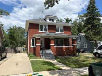 Ferndale Exterior Trim Restoration and Gutter System Installation by Top Shelf Painter