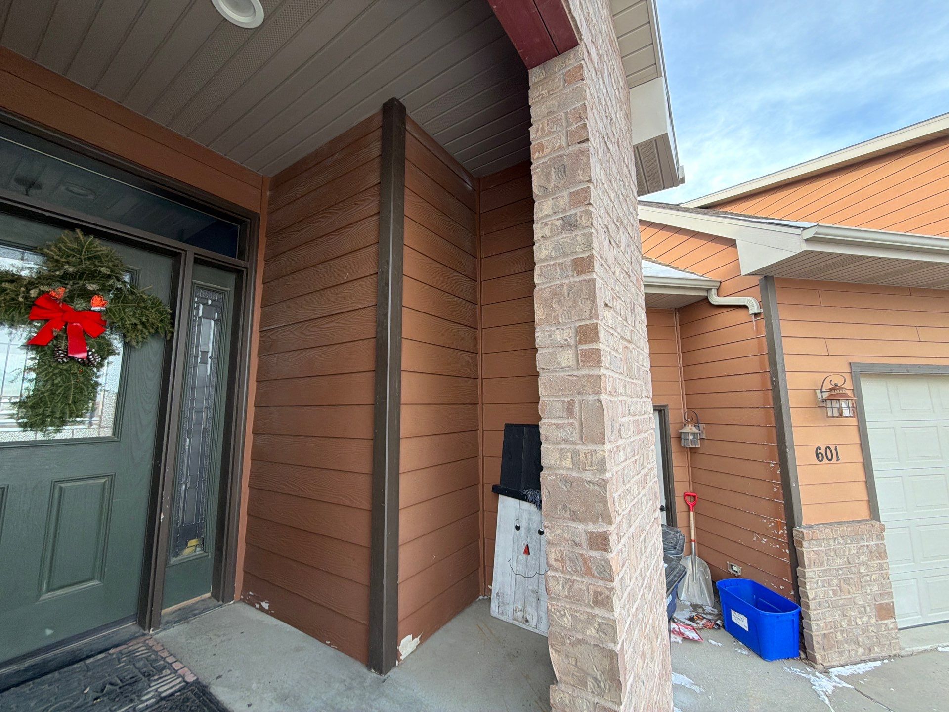 Residential Exterior Painting and Siding Restoration in Crooks by Select Painting, Coatings & Garage Cabinets