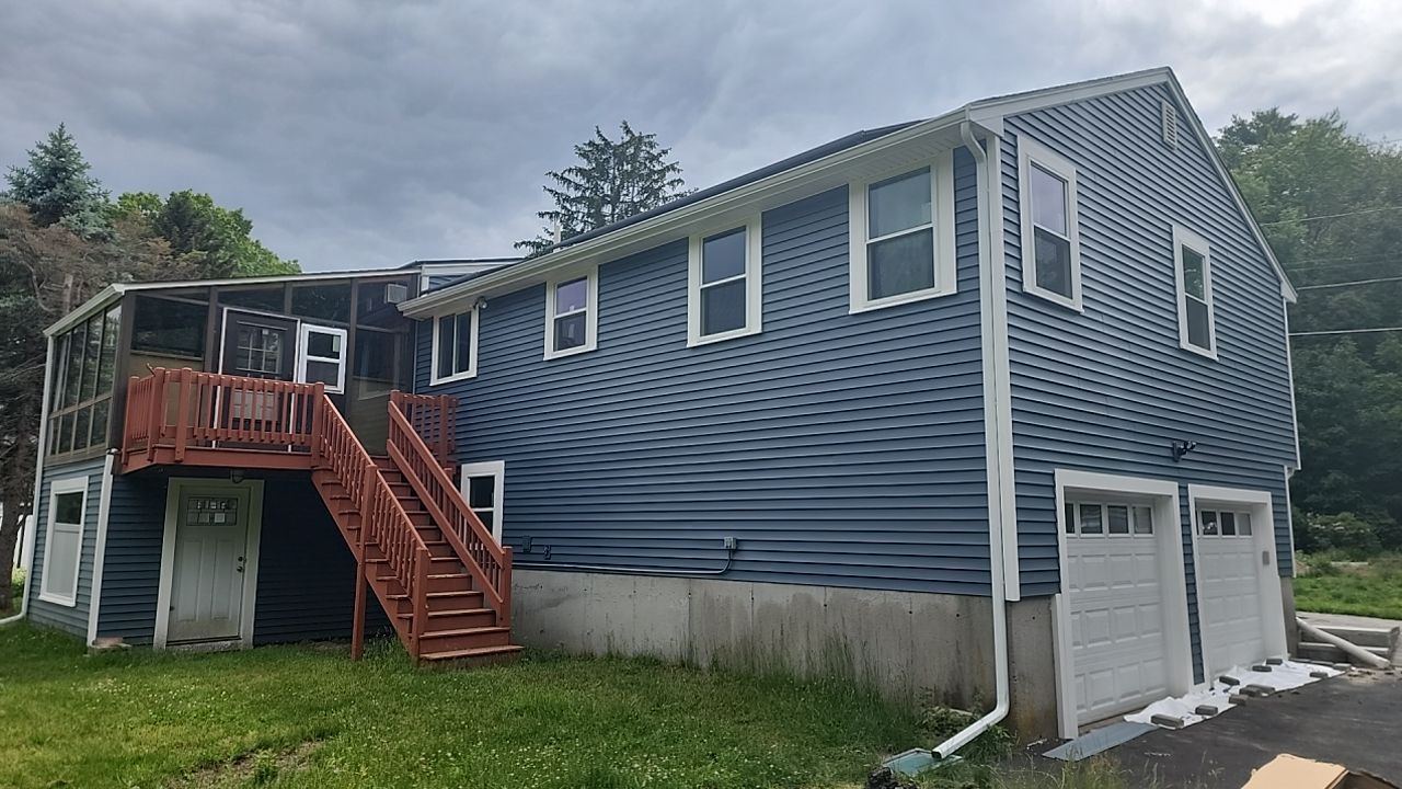 Siding and windows replaced by UBrothers Construction