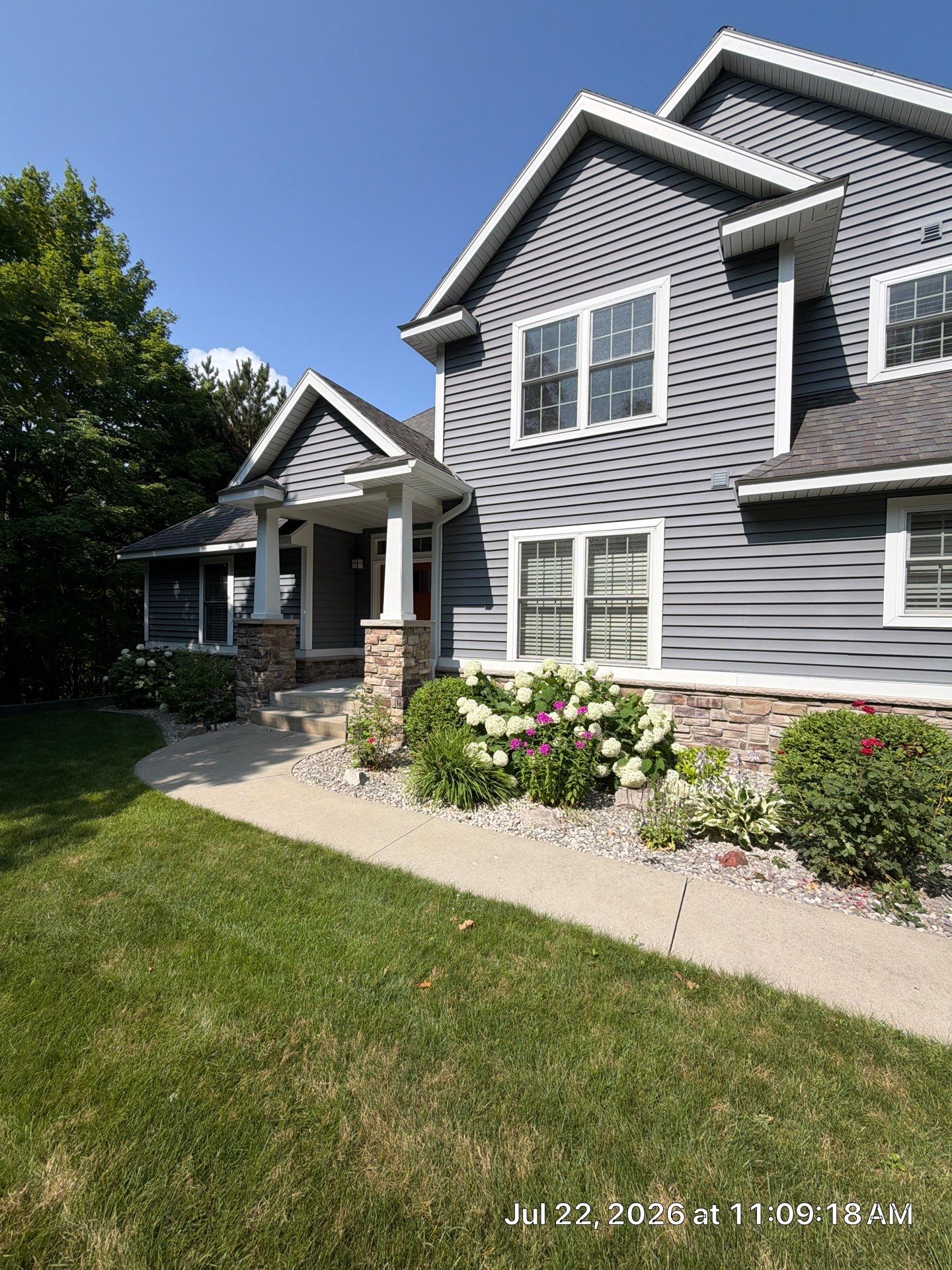 Gutter Helmet Protection System Installation for Traverse City Home by Rainbow Seamless Systems
