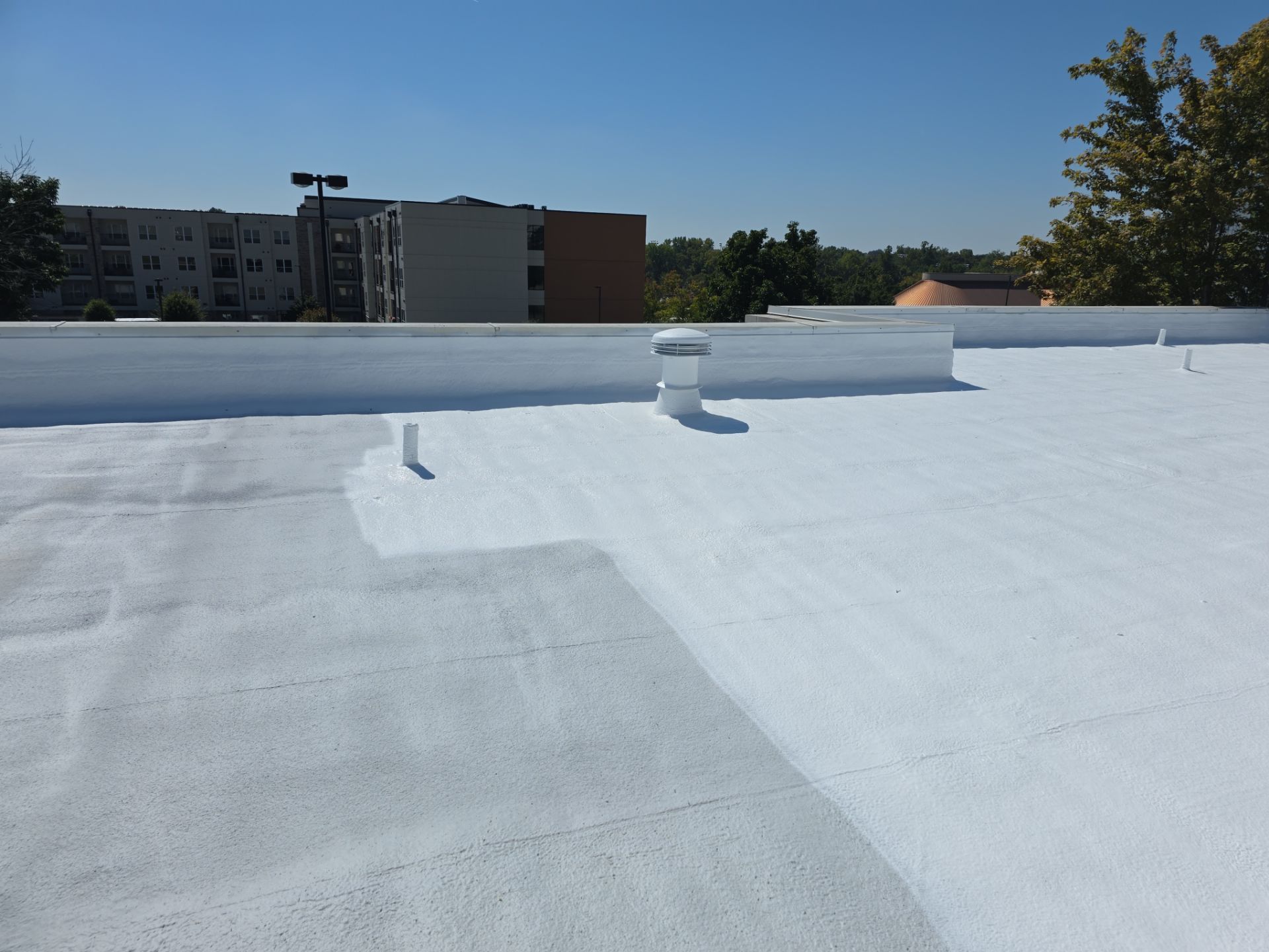 Commercial Roofing Install - SPF Foam & Coatings Restoration & EPDM System - Color White  by Titan Commercial & Residential Roofing 