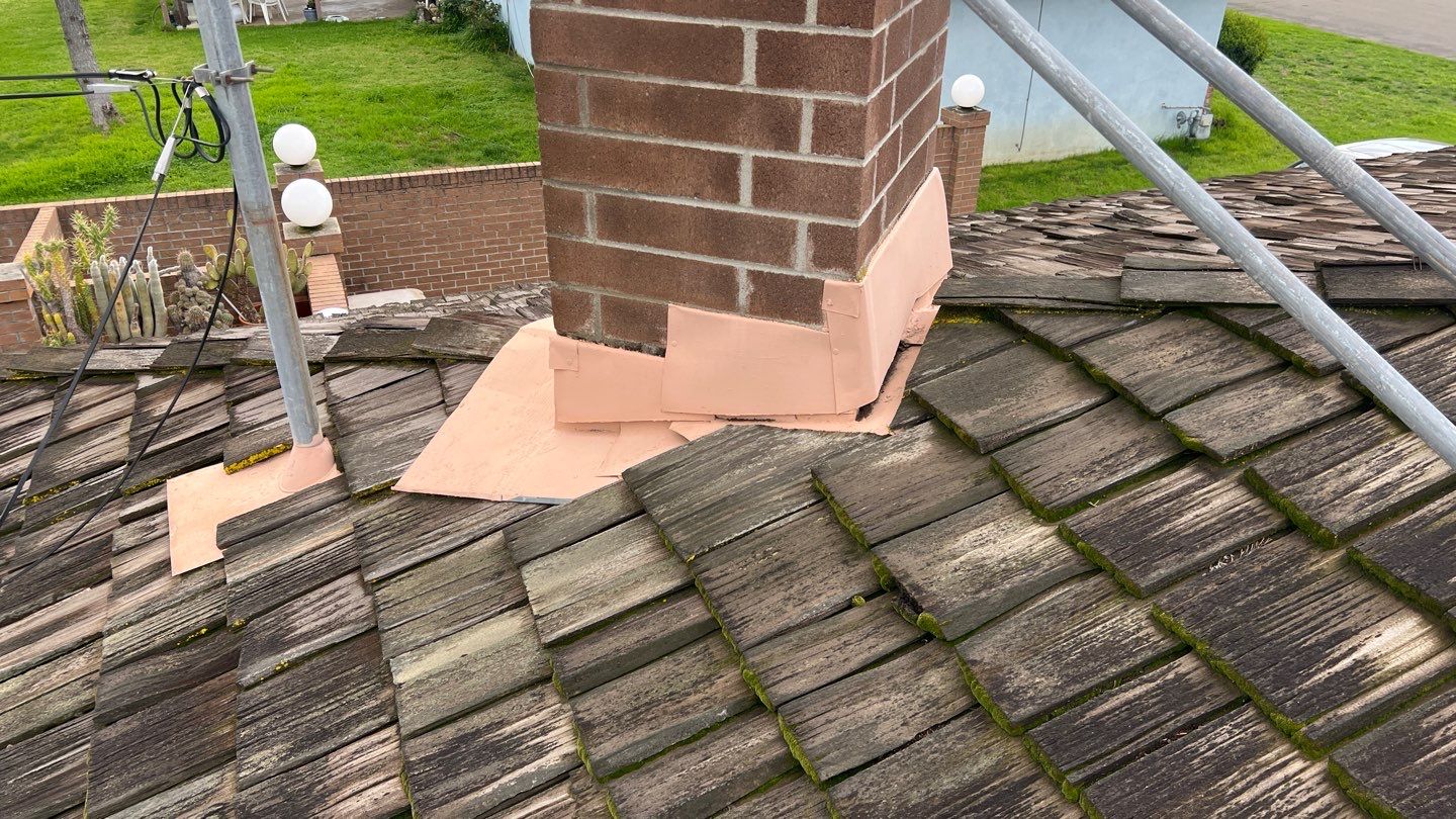 Installation of Certainteed Presidential shingles on residential house by Straight Edge Roofing Inc