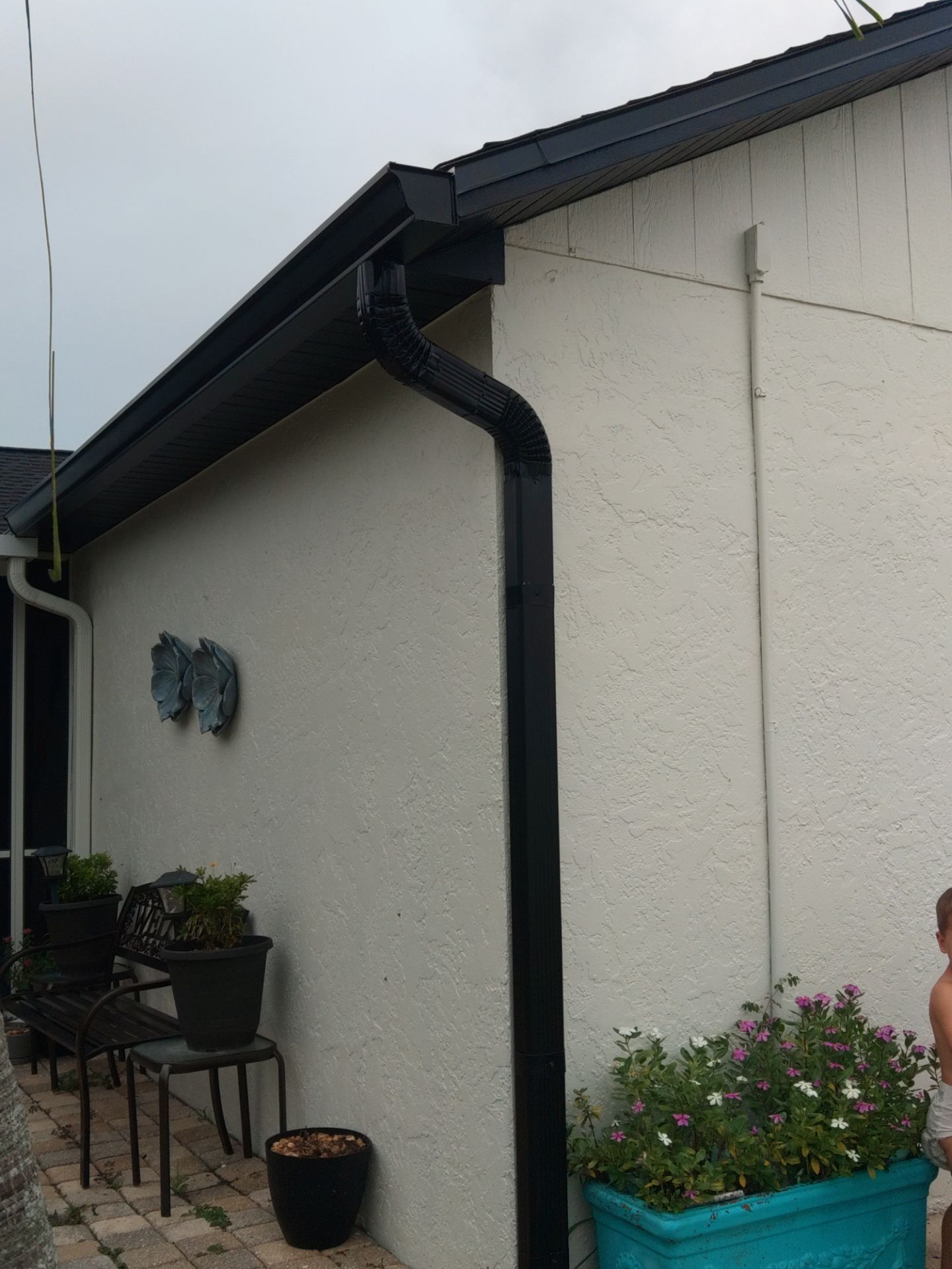 Black Seamless Gutters for Modern Cape Coral Homes by Gutter Professors