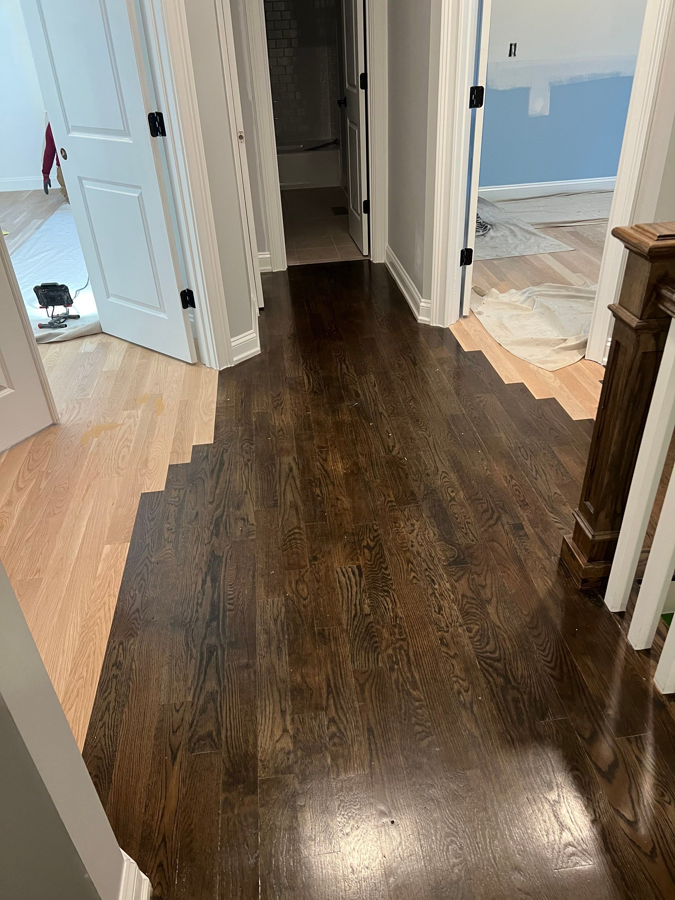 Adding hardwood floors to bedrooms by Accent Custom Floors