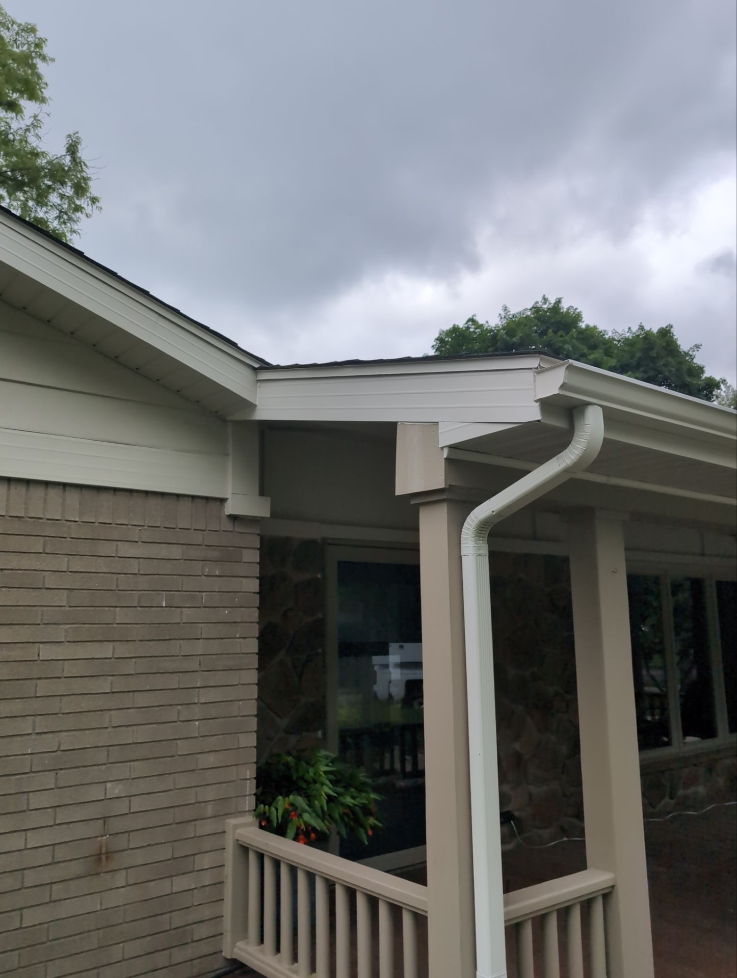 Installing new Roof, Fascia, Soffit, and Gutters. New custom trim around garage door. by Acme Exteriors