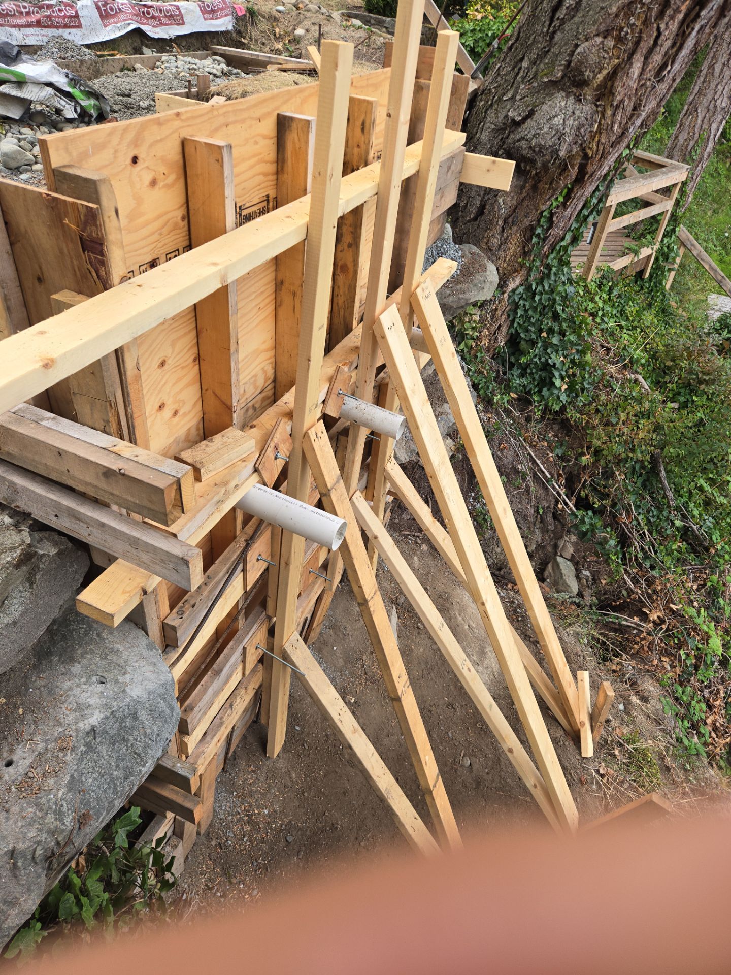 Coastal Landscape Restoration & Retaining Structure - In progress by Habanero Garden and Exterior Care