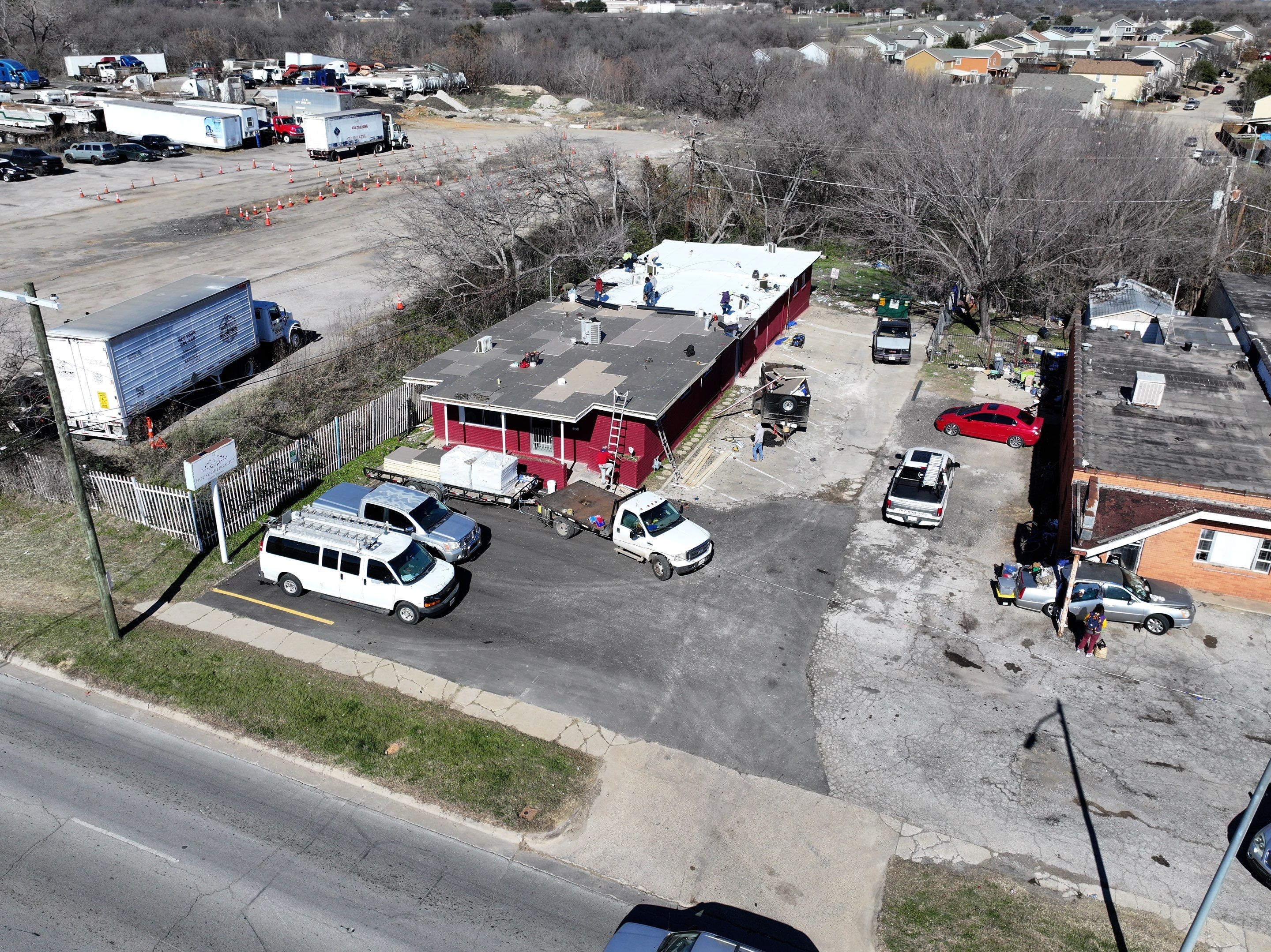 Commercial roofing overlay using GAF TPO over an old ballast roof by Becker Roofing and Exteriors