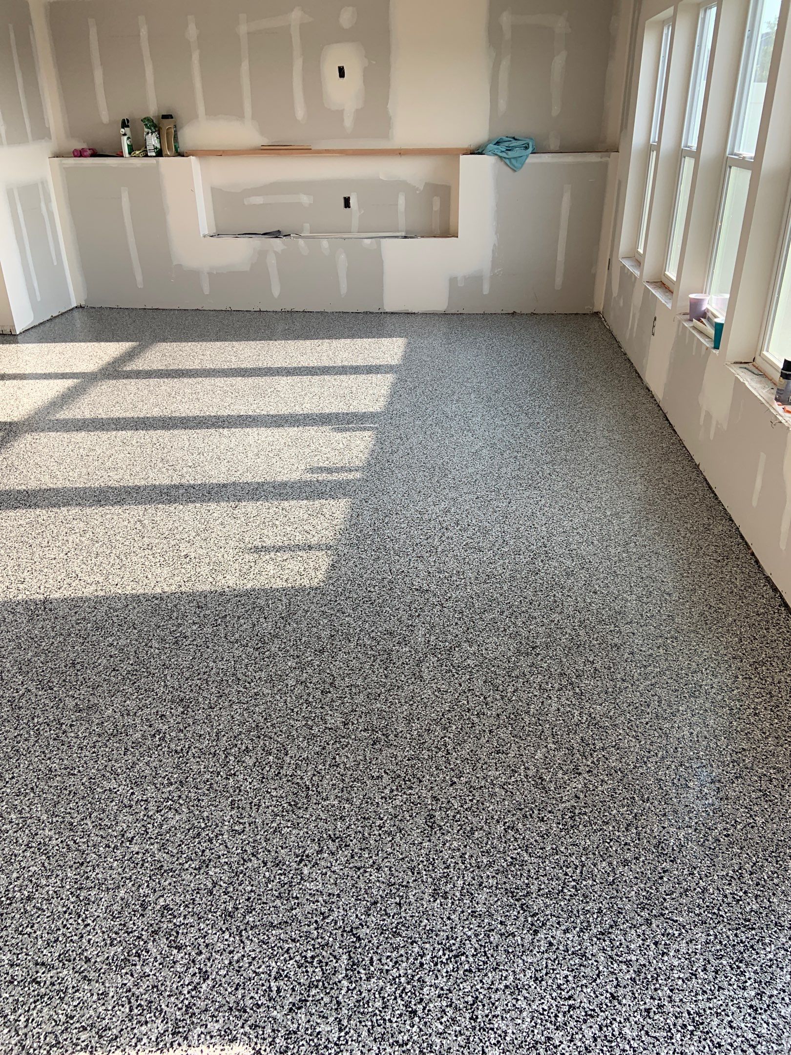 Basement Transformation using Domino by Croc Coatings, LLC
