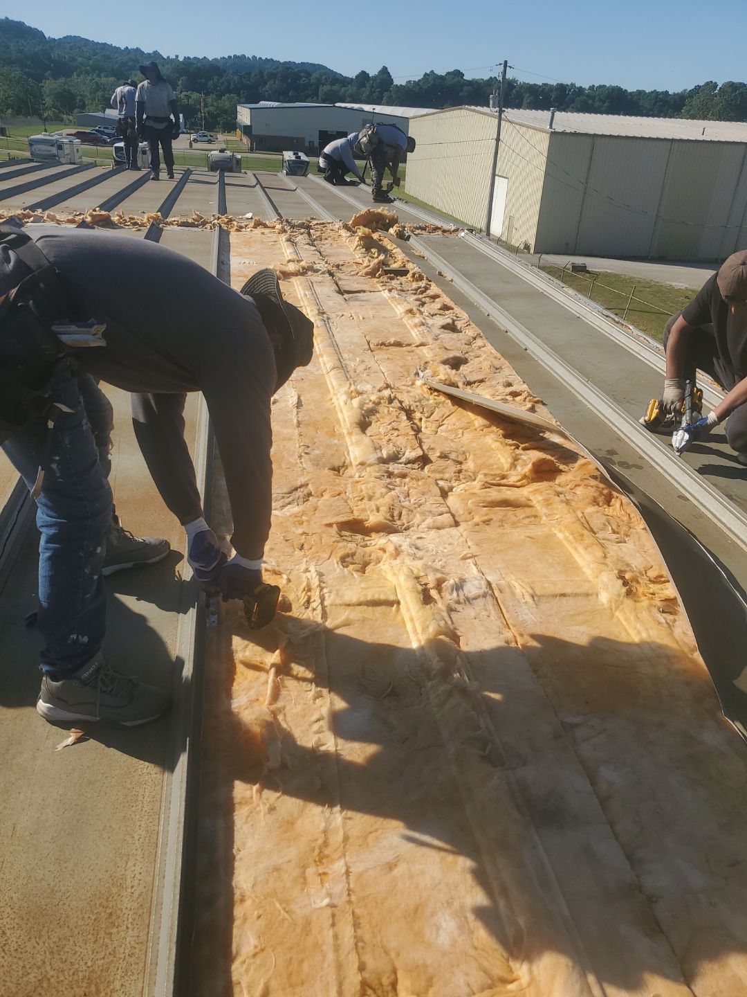 Commercial Roofing Installation using Metal by Rainstoppers Roofing