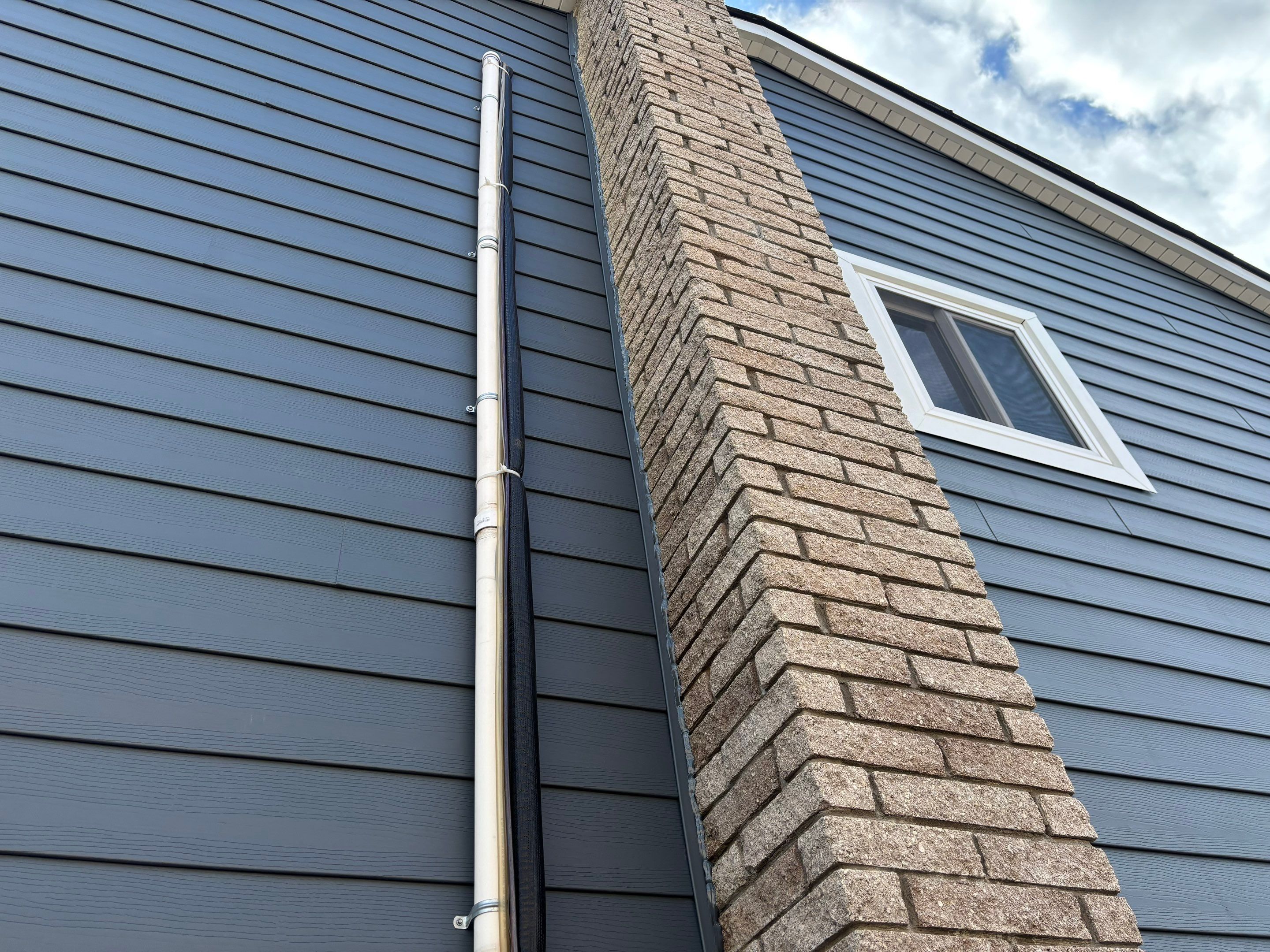 Siding Replacement using Alside Midnight Blue by 180 Contractors