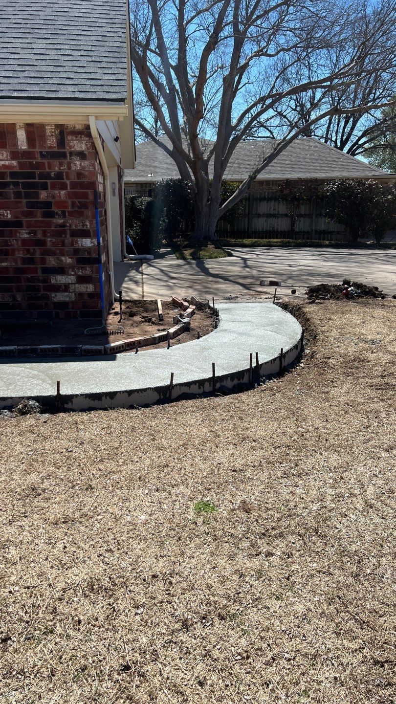 Concrete sidewalk using Concrete by Clays Services Inc
