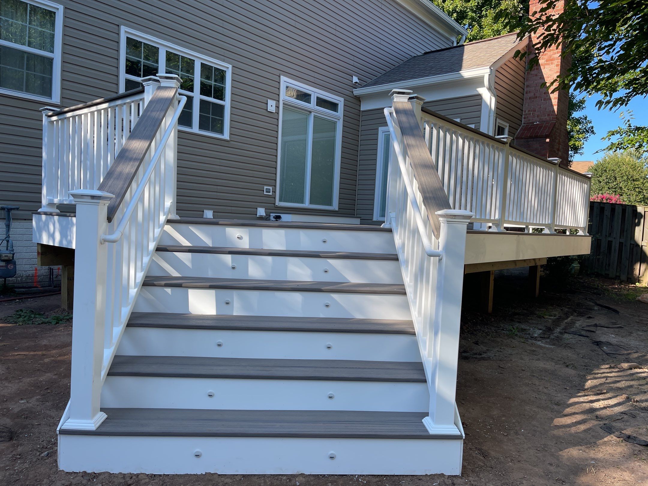 Deck Installation using Trex Rocky Harbor Decking by RJC General Construction, LLC.
