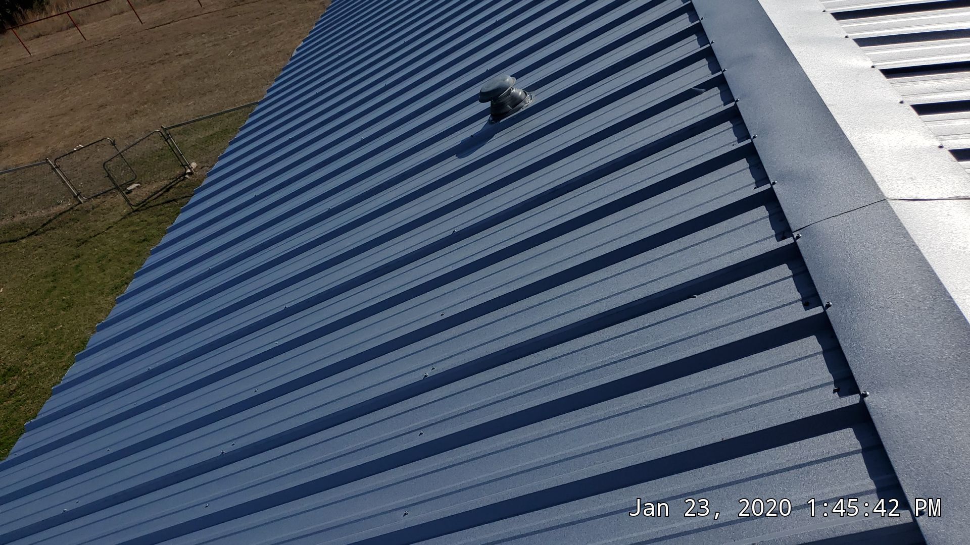 Residential Roofing Installation using PBR Metal Roof by Harvey Roofing & Construction