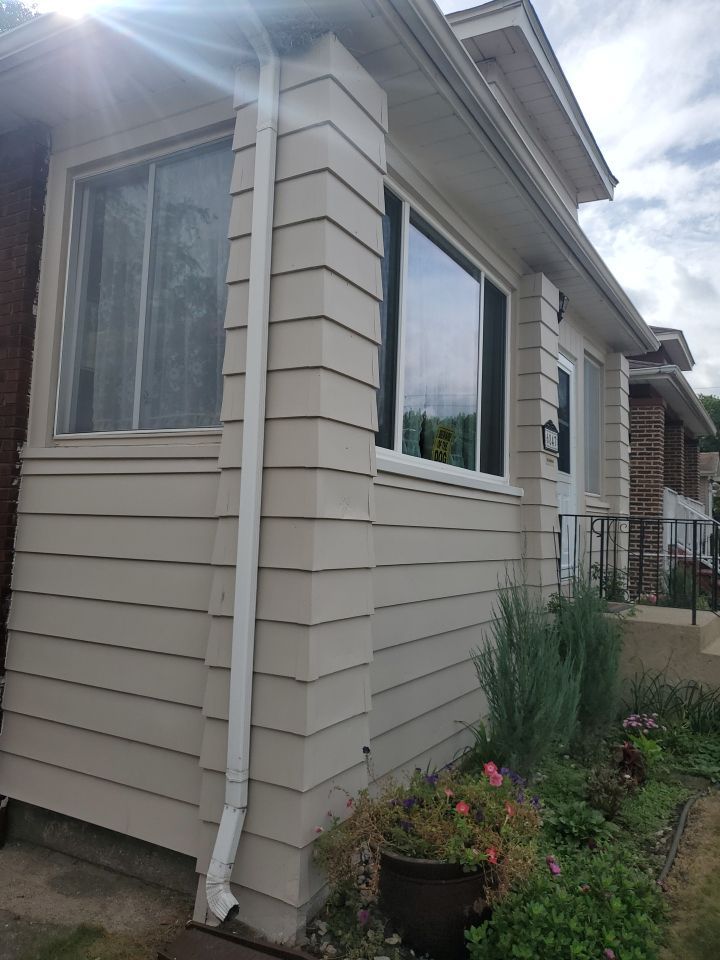 Window Installation using vinyl windows by Kraz Construction