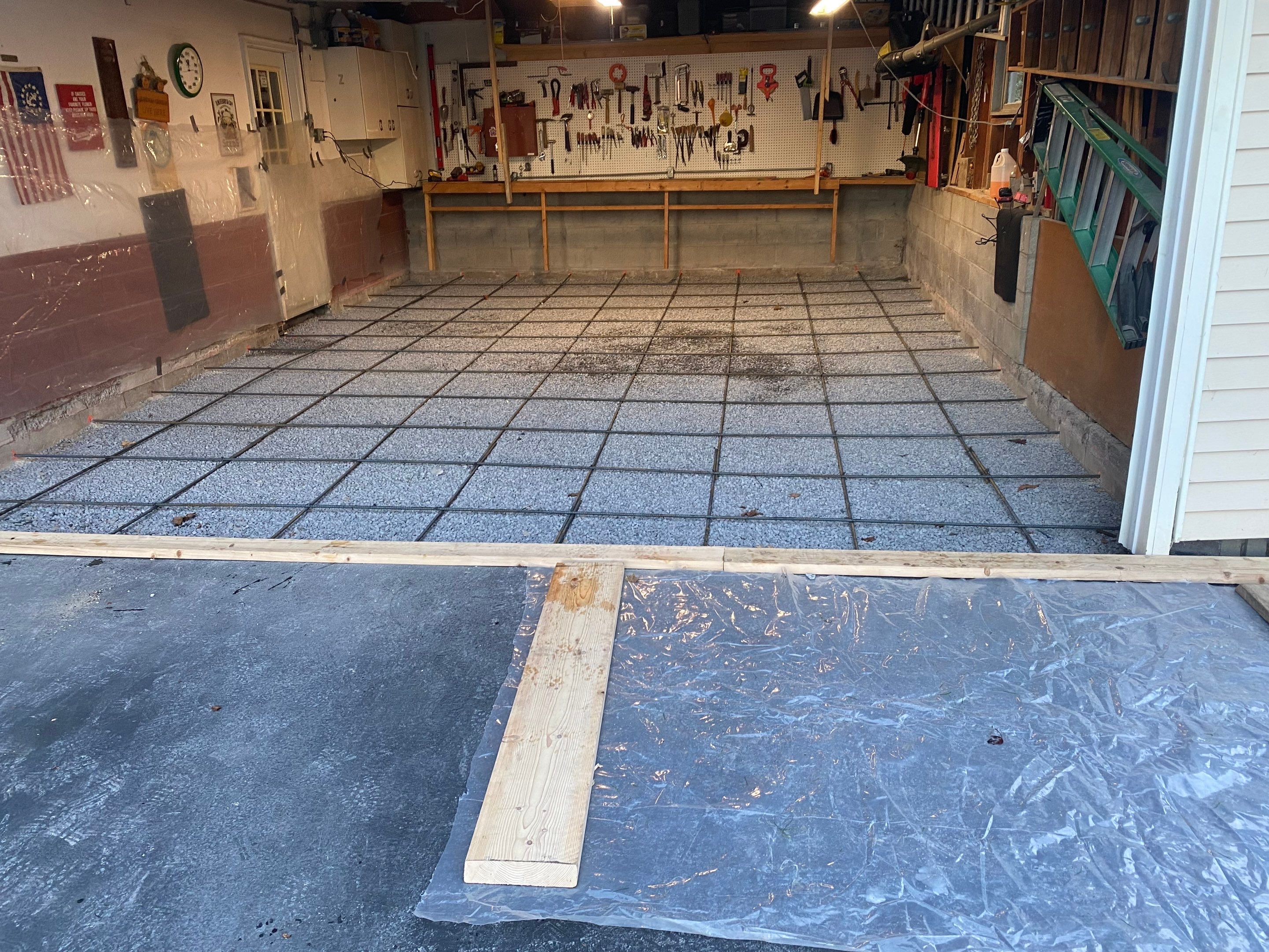 Concrete garage floor replacement  by NG Masonry & Construction LLC