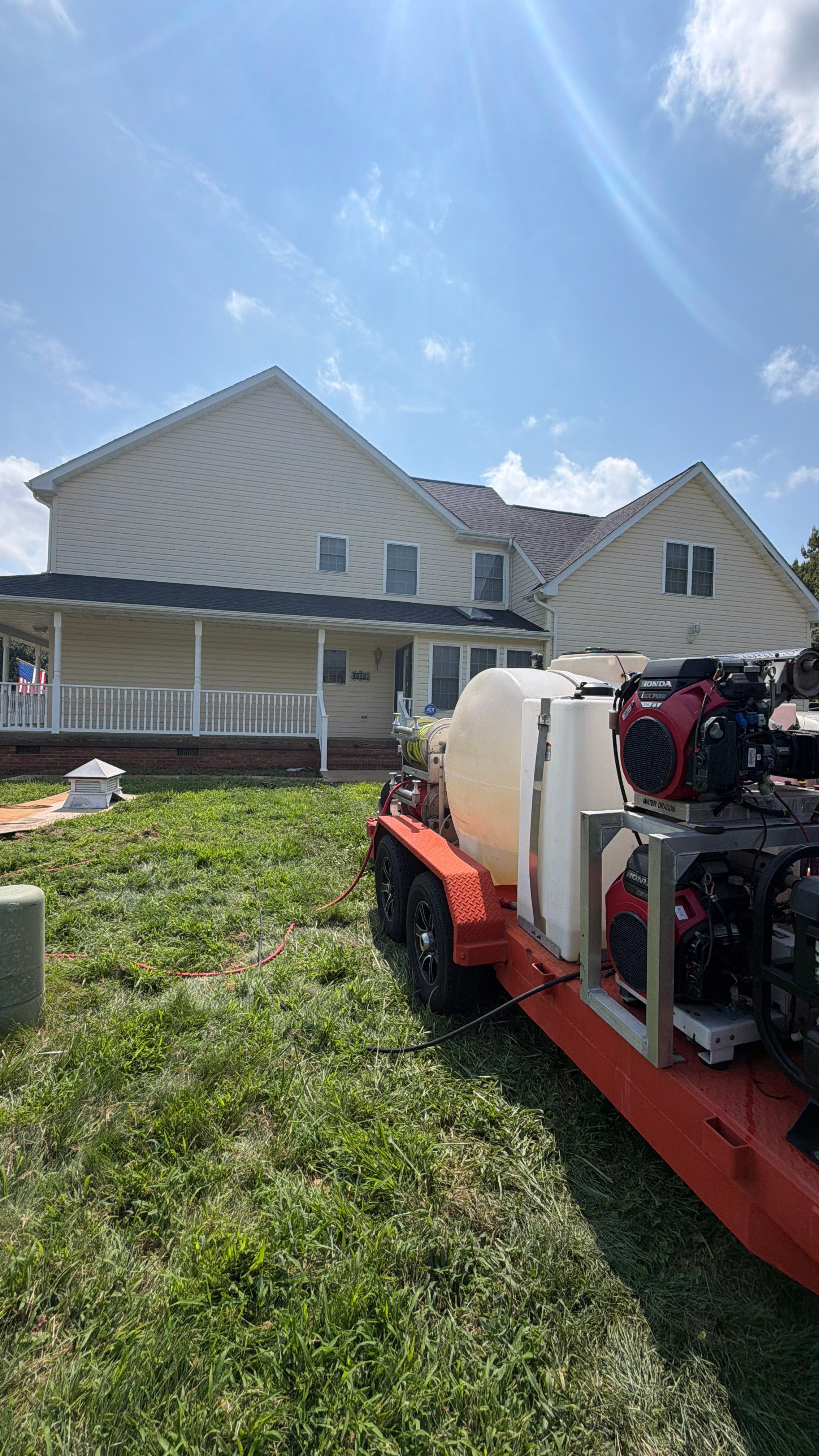 Vinyl Siding House Washing and Wood Deck Restoration in Carroll County by Baltimore Pressure Washers Inc.