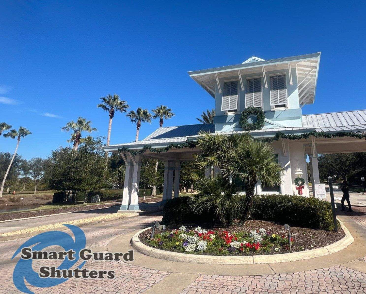 Decorative Bahama Shutters in Window Grey by Smart Guard Shutters