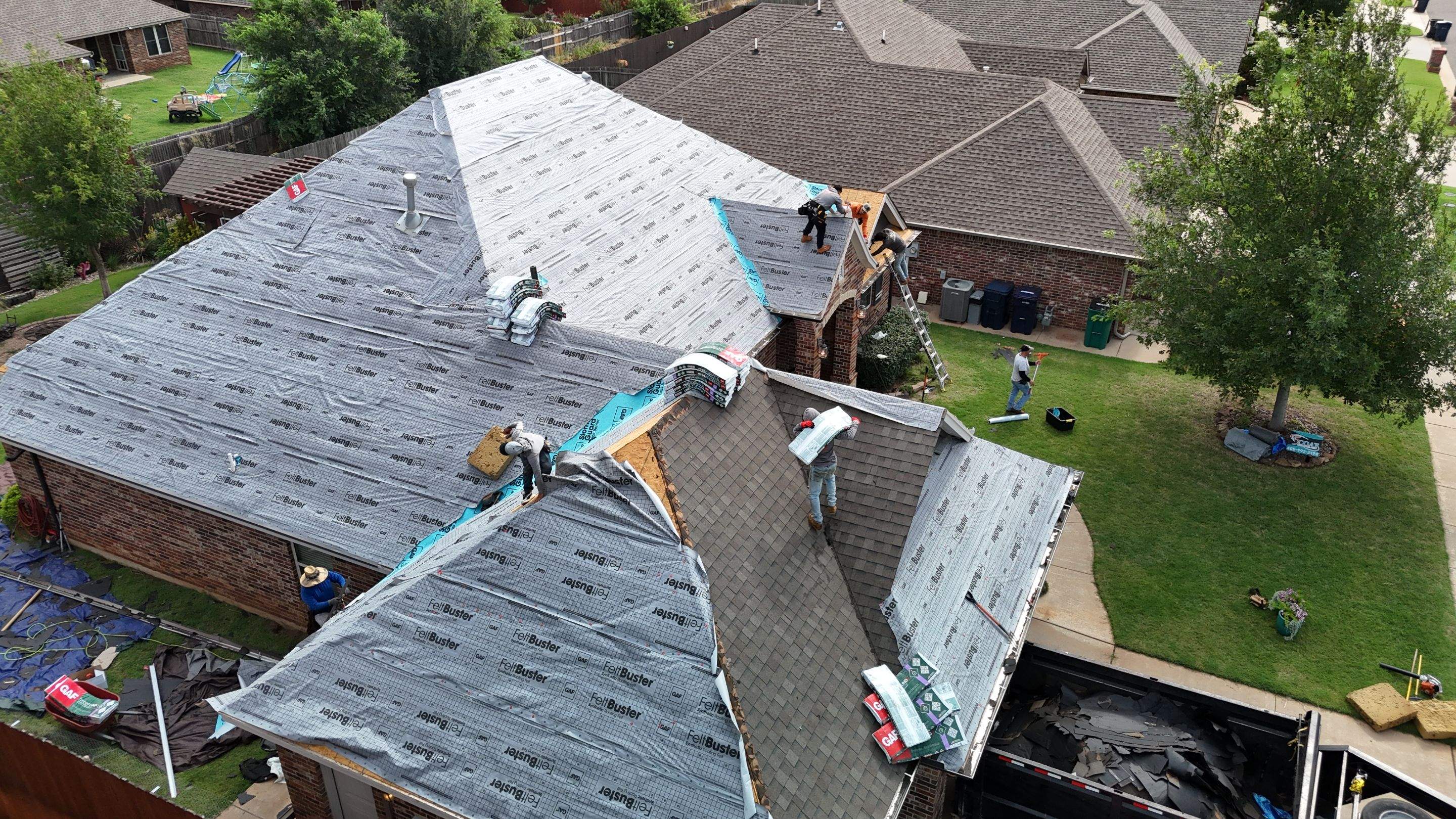 GAF Architectural Shingle Roof Replacement and Decking Repair in Mustang by 5Coat Roofing & Construction